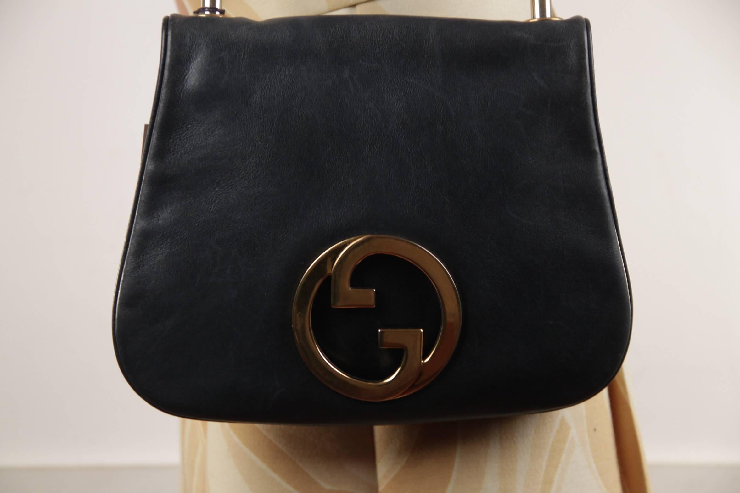  Brand: GUCCI - Made in Italy

Logos / Tags: 'Made in Italy by GUCCI' embossed inside, big GG - GUCCI logo on the front

Condition (please read our condition chart below): GENTLY USED~ Previously used, but no signs of significant soiling,