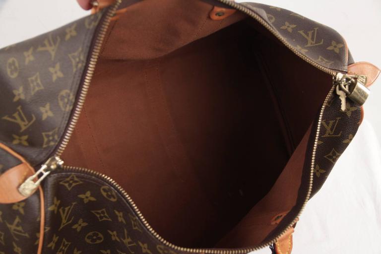 Louis Vuitton 2000s Brown Monogram Keepall Leather Duffle · INTO
