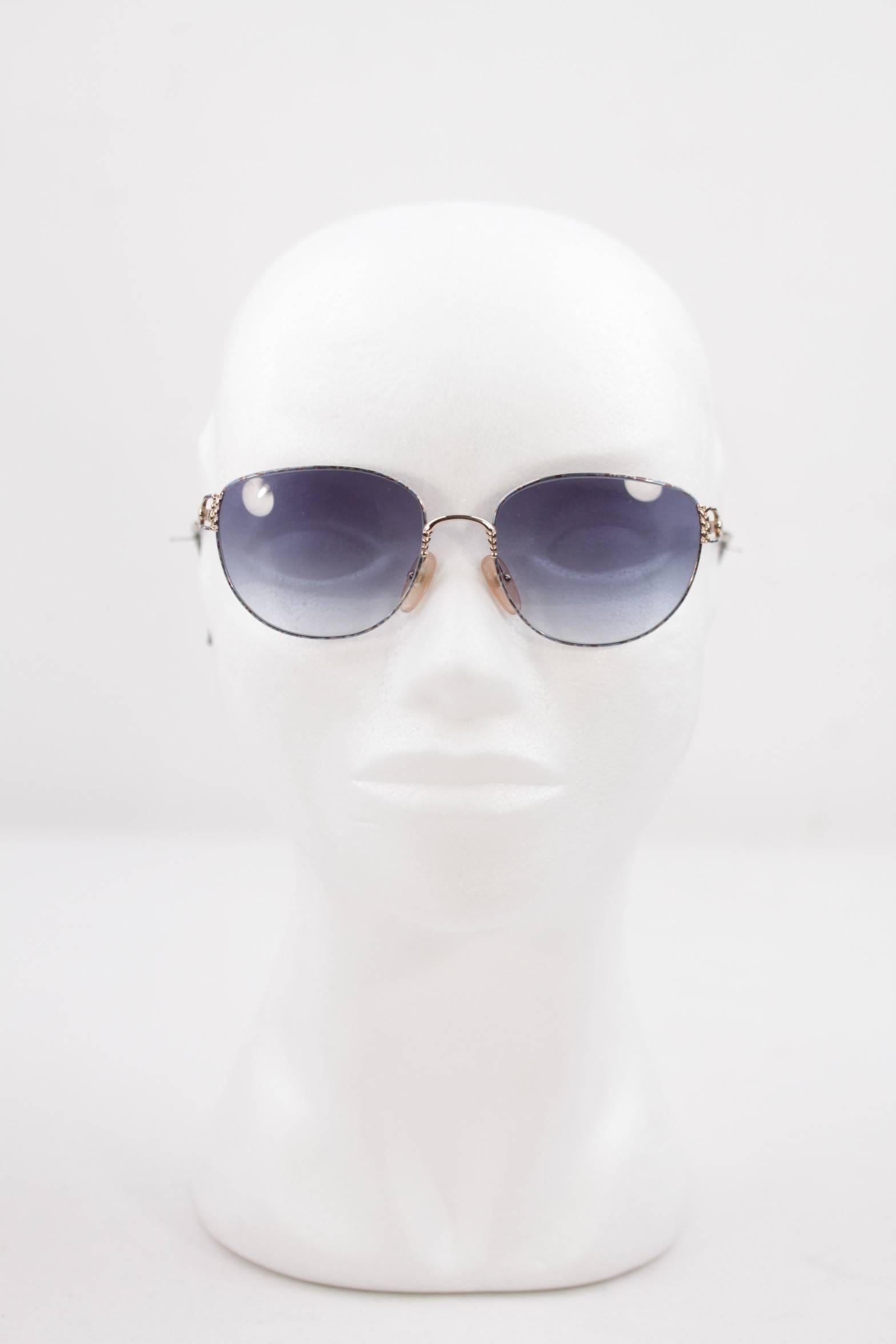 - CHRISTIAN DIOR - Made in Austria

- Style Name & Number: 2880 - 46 - 53/17 - 130

- Gold metal Frame with blue accents (CD logos on the temples)

- Gradient/Faded Blue lenses

Condition: GENTLY USED~ Previously used. Lens may have some