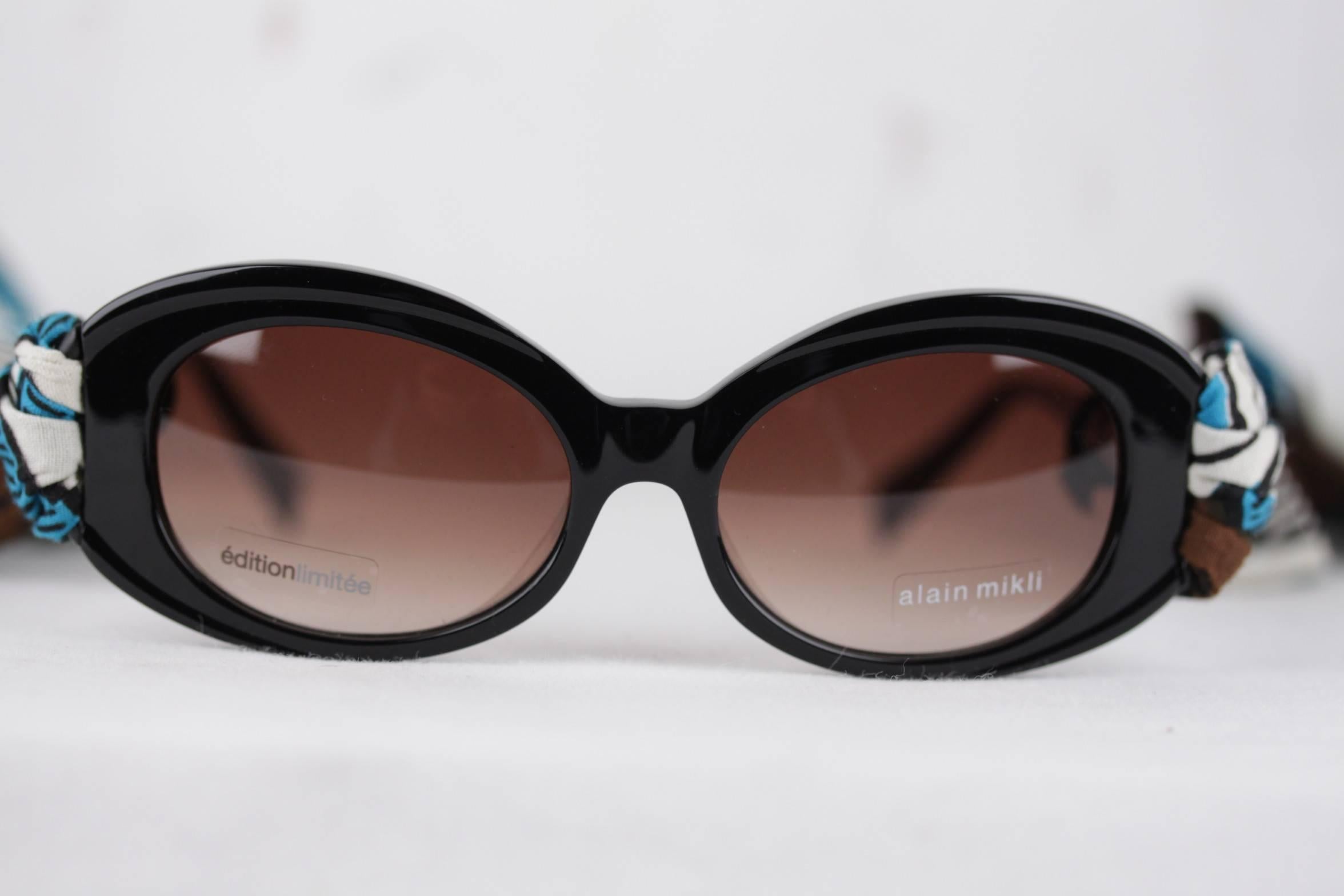 Black Alain Mikli Imany Collection Oval Limited Edition Collection Sunglasses  