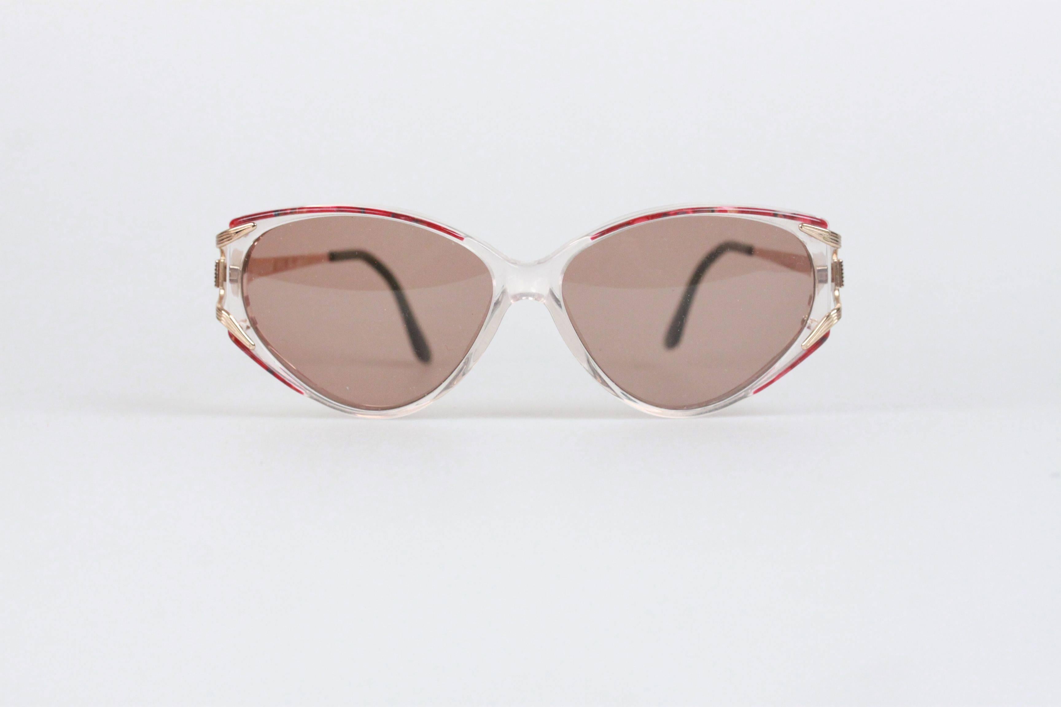 - Vintage YVES SAINT LAURENT sunglasses 
- mod: 5032 Y651 55/13 135
- Beautiful Red Marbled effect on the top part of the frame 
- Brown MINT 100% UV GRADIENT lens

Any other detail which is not mentioned may be seen on the item pictures. Please do
