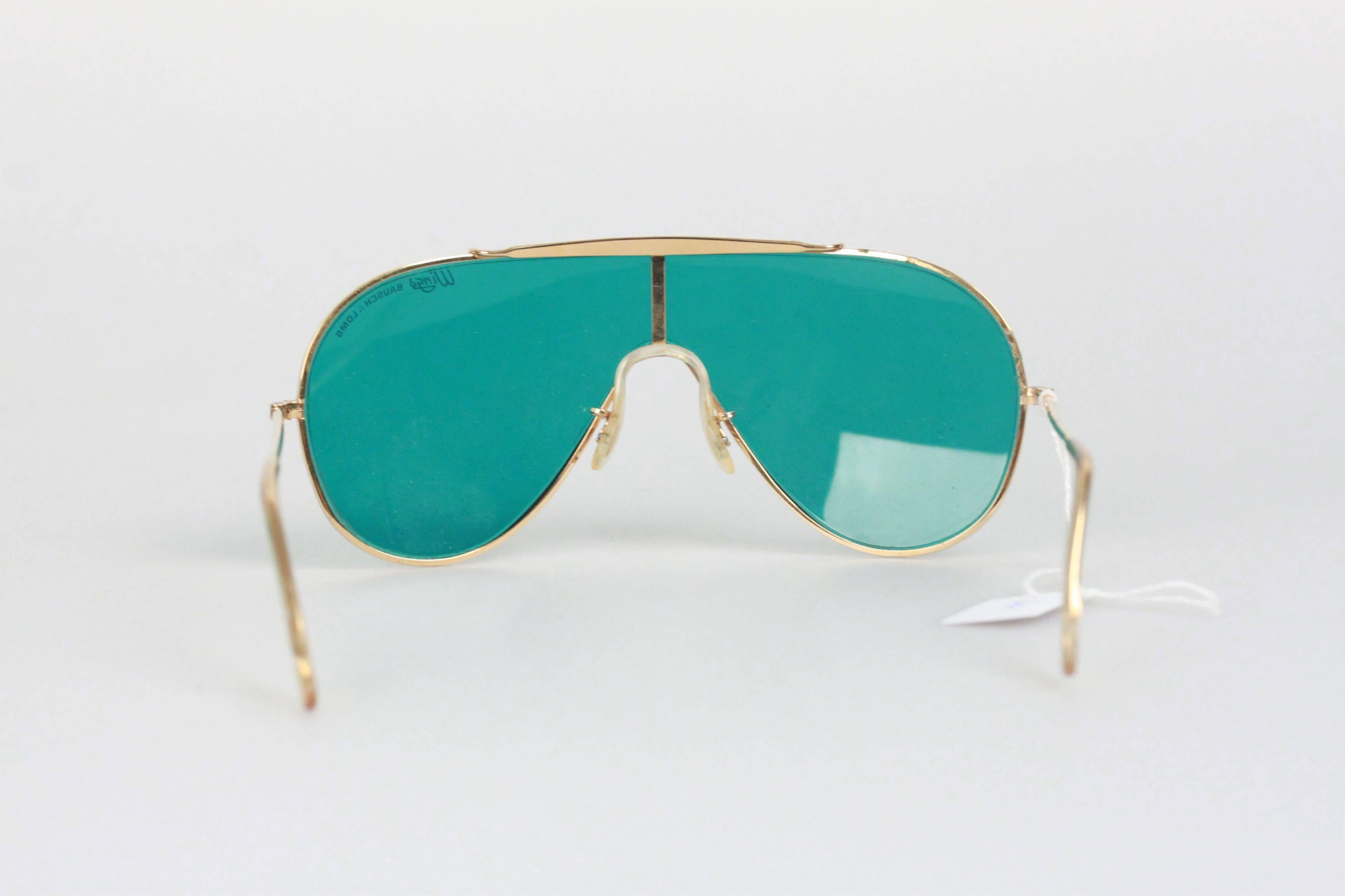 RAY-BAN Bausch & Lomb Vintage Gold metal WINGS One Piece Shield SUNGLASSES In Excellent Condition In Rome, Rome