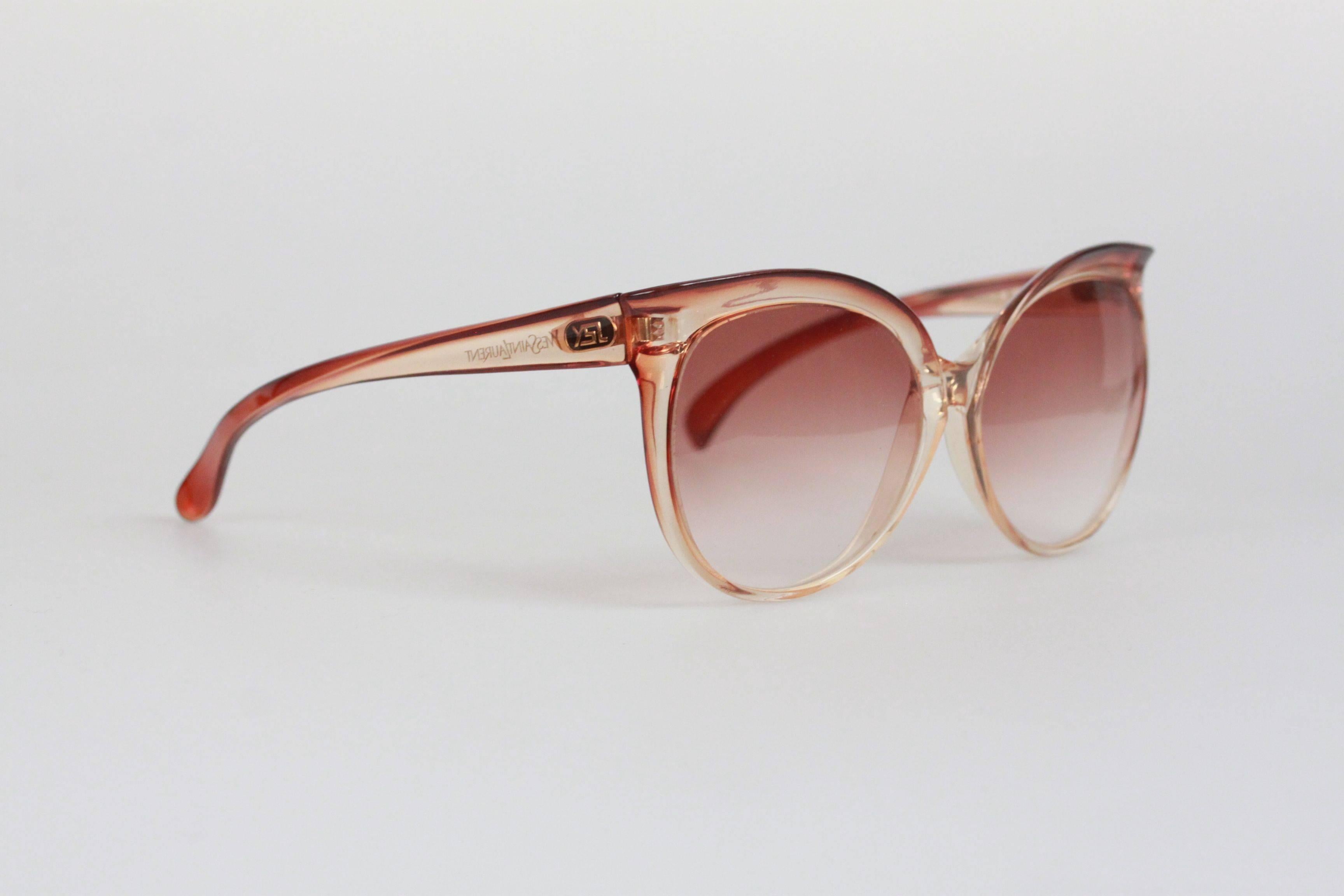 - Butterfly vintage sunglasses by YVES SAINT LAURENT from the 80s
- Mod. 8059 
- Clear Brown & Beige plastic frame 
- Gradient brown lens
- YVES SAINT LAURENT signature on temples
- Hand-Made in France

Any other detail which is not mentioned may be