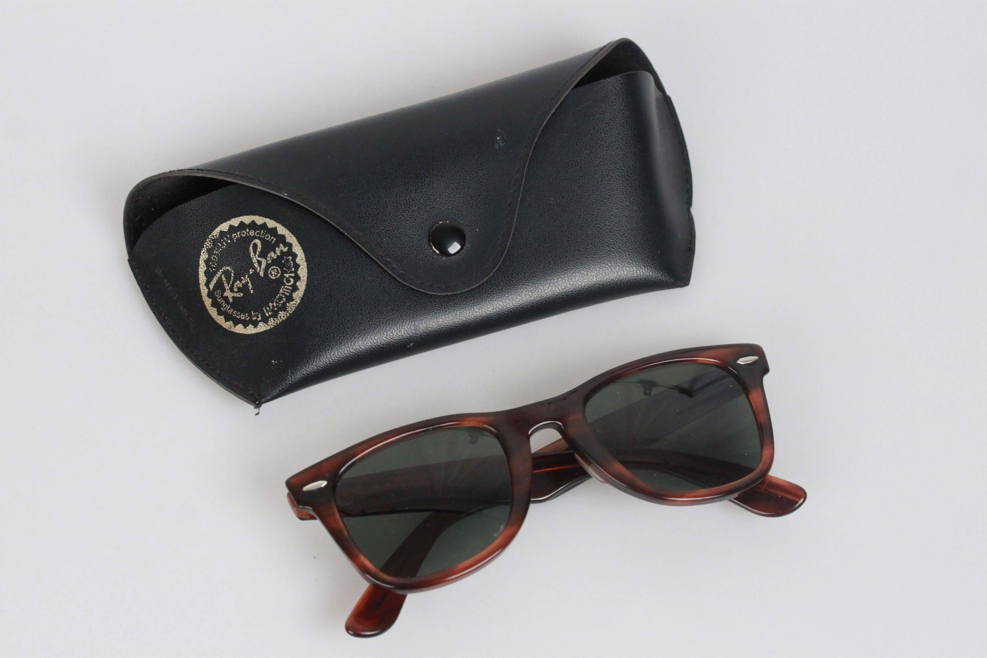 - Legendary vintage sunglasses by Ray-Ban Bausch & Lomb, mod.WAYFARER, B&L5024
- Brown acetate frame
- Original BAUSCH & LOMB green lenses (BL logos on temples)
- They will come with a RAY BAN case

Any other detail which is not