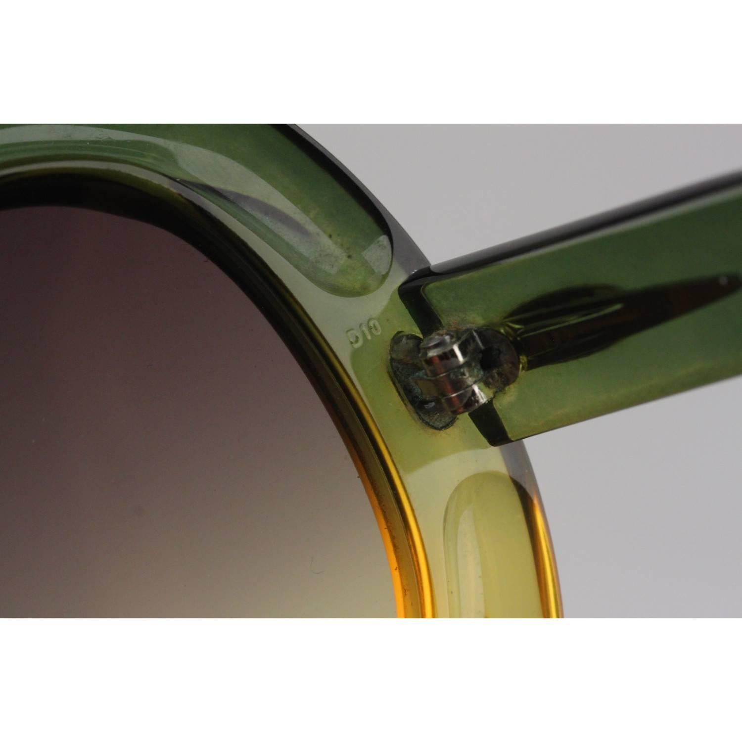 - Supreme, Spectacular Oversized Shades by CHRISTIAN DIOR
- Entirely handmade, a work of art
- Beautiful semi-transparent bi-color (green and yellow) OPTYL / Acetate frame, with gradient & bi-color lens (from blue to yellow)
- MINT / EXCELLENT
