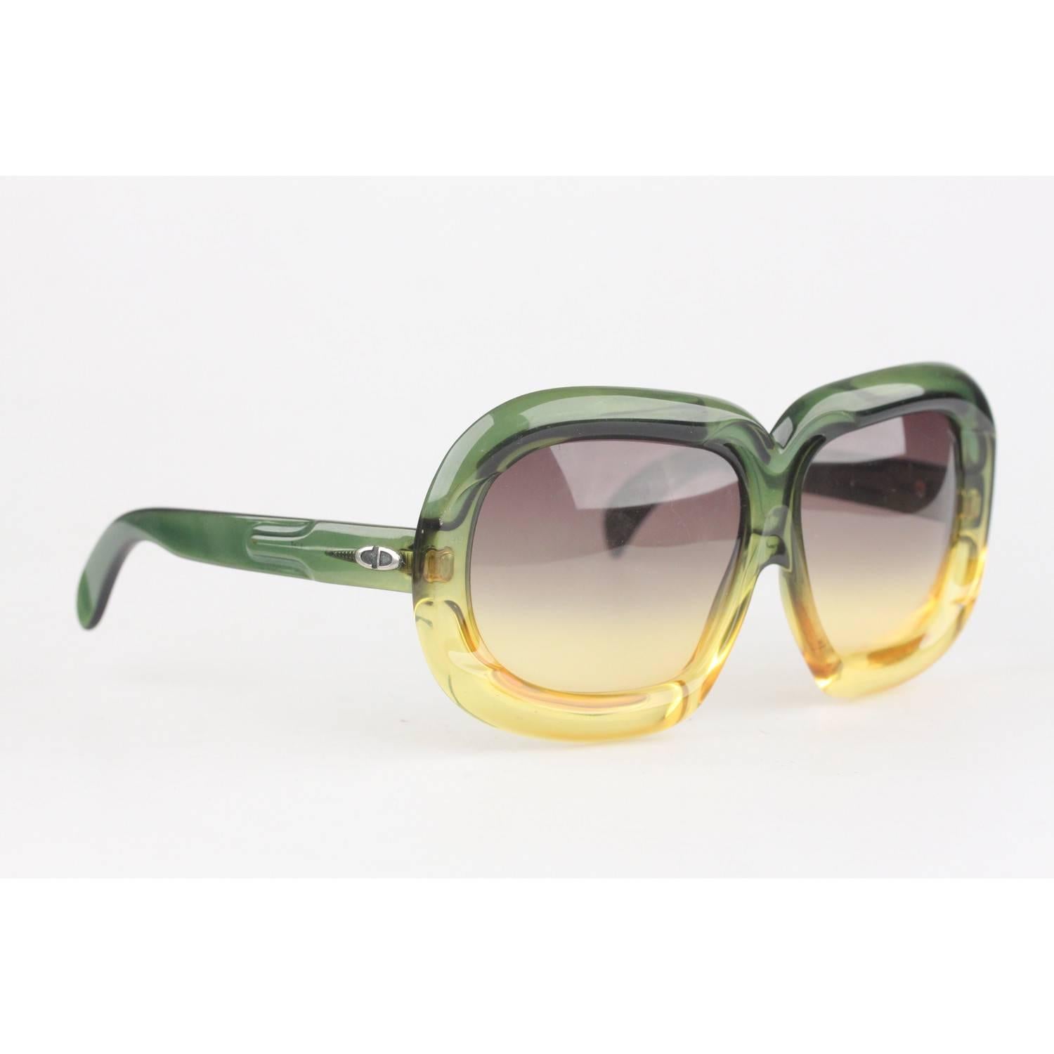 green and yellow sunglasses