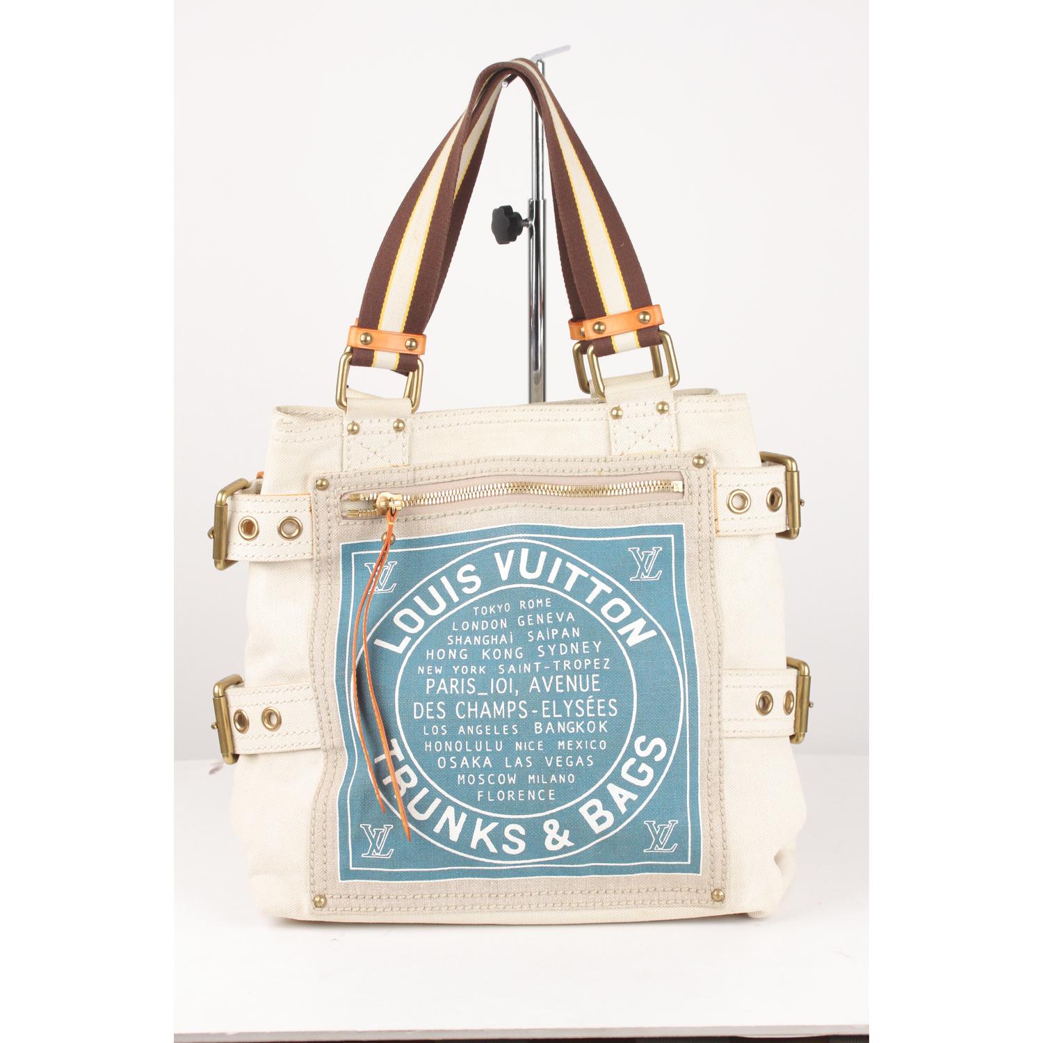 Collectible Louis Vuitton GLOBE Cabas MM tote - Limited edition piece is from the Globe Shopper line, designed for the Cruise 2005 Collection - It is made from a beige cotton and linen canvas perfectly screen printed a blue 