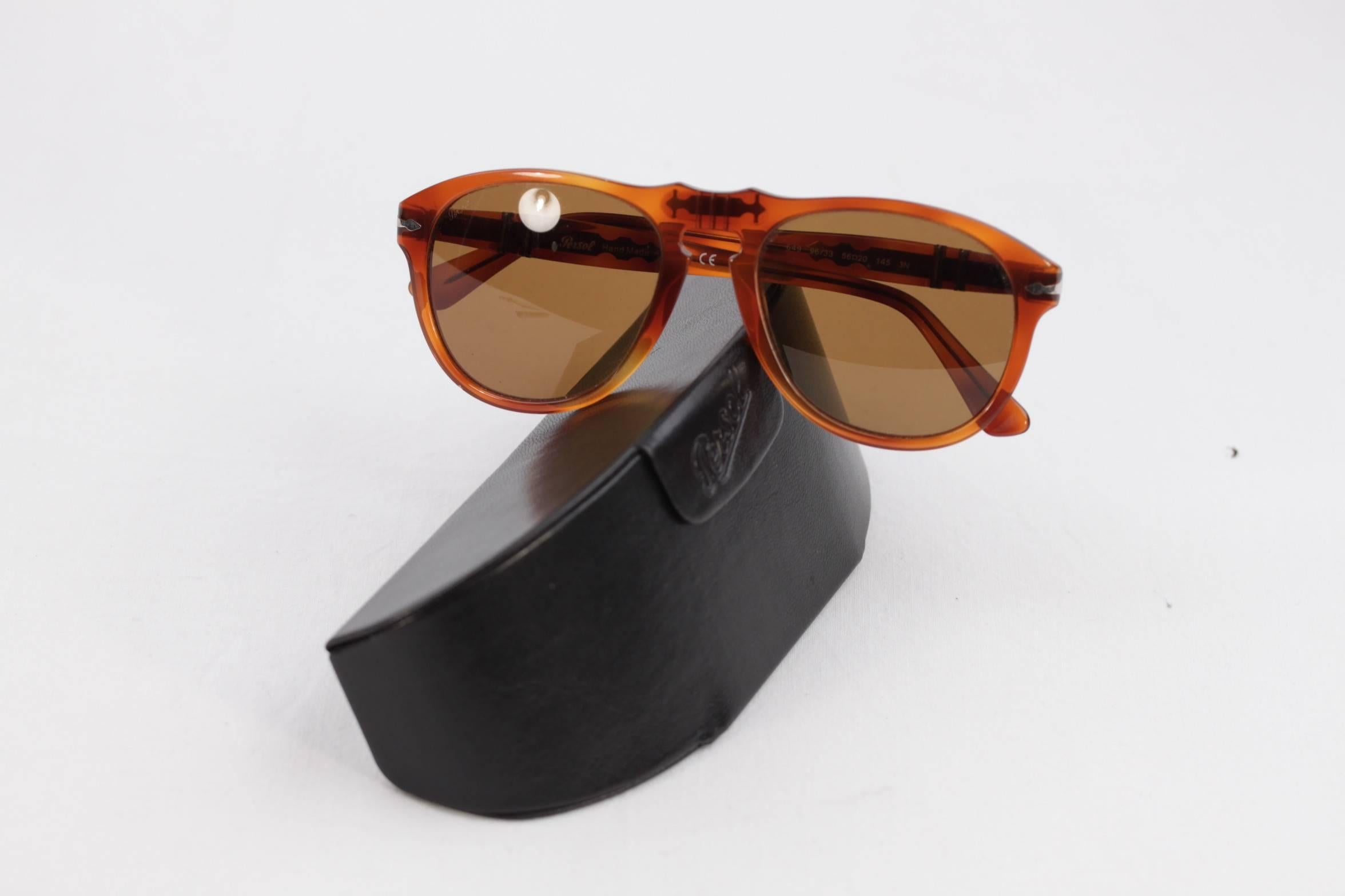Brand: PERSOL

Made in: Italy

Style Name & Number: 649 - 96/33 - 56/20 - 145 - 3N - Hand made in Italy

Condition:

MINT~ Appears new, with imperceptible signs of use. Lens/filters may have micro scatches, which are NOT VISIBLE and NOT