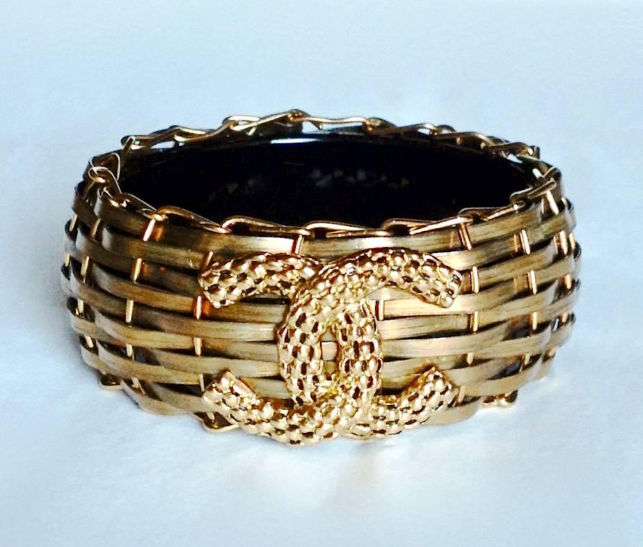 THIS ultra well made artisan piece is from Chanel 2008 resort collection, now has become too rare to find another one. 
To give a peek of ancient South Asia ancient people's plain and carefree life style, Chanel skilled artist braided solid bronze