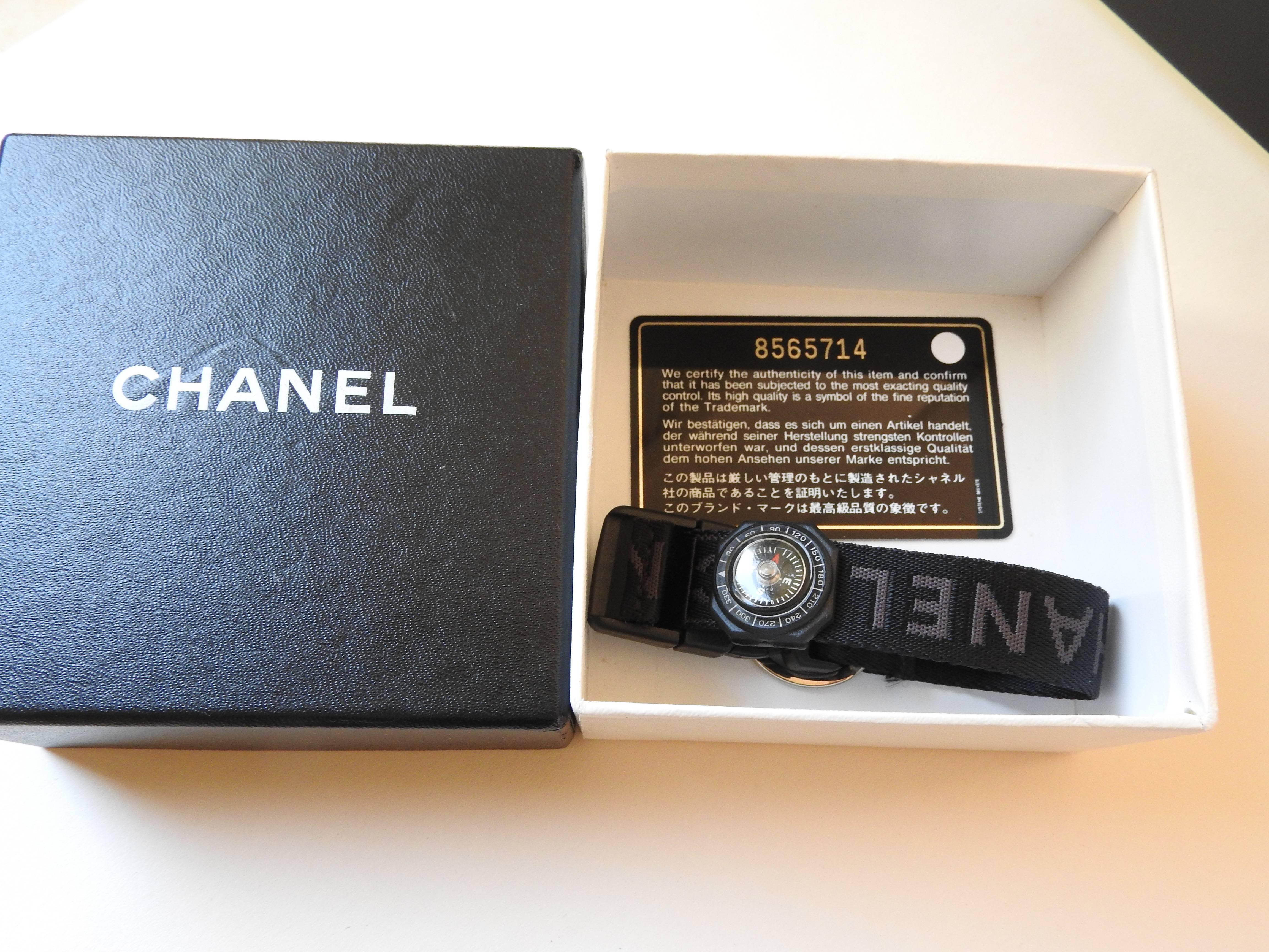 THIS Chanel bracelet style compass was from 2003.  Designed with a key ring.
It's not in store fresh anymore due to the age, but it's never been used in mint and clean condition . 
 COMES : With  Its authenticity card with match its Chanel handbag