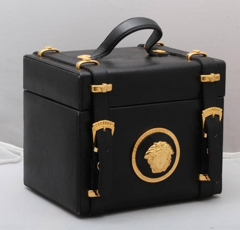 Gianni Versace Couture Vanity bag with Medusa motifs. Comes with a detachable mirror.