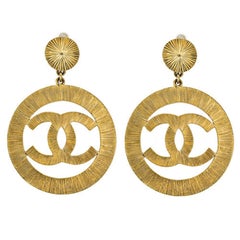 Chanel CC large gold dangling earrings