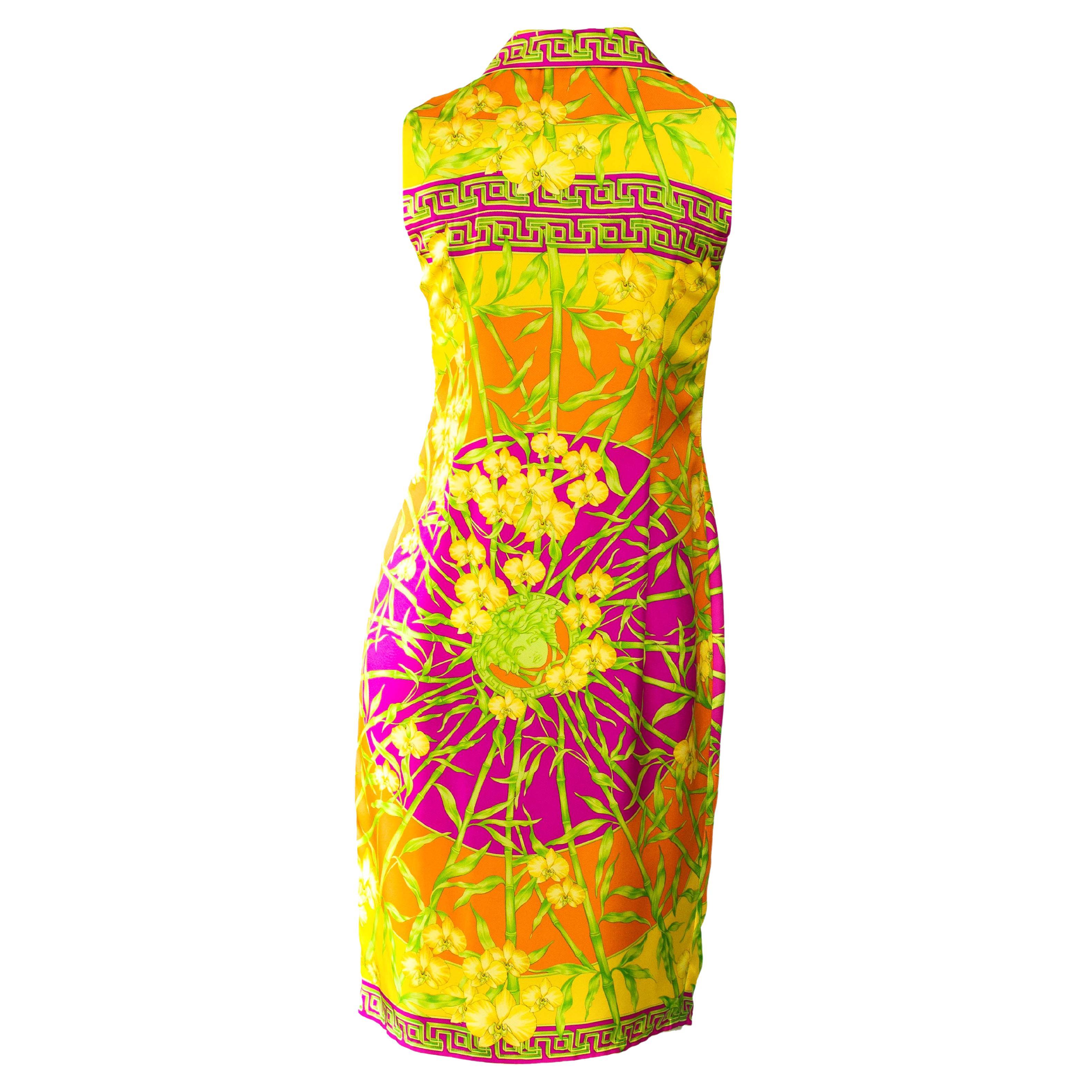 This Versace take on a collared 'ladies who lunch' dress was designed by Donatella Versace. This dress by Gianni Versace for the Spring/Summer 2000 collection and includes an orchid jungle motif, similar to Donatella's famous jungle print seen on