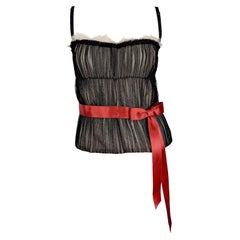 Dolce & Gabbana - P/E 2006 - Top bustier disossato con corsetto in tulle nero trasparente e fiocco rosso