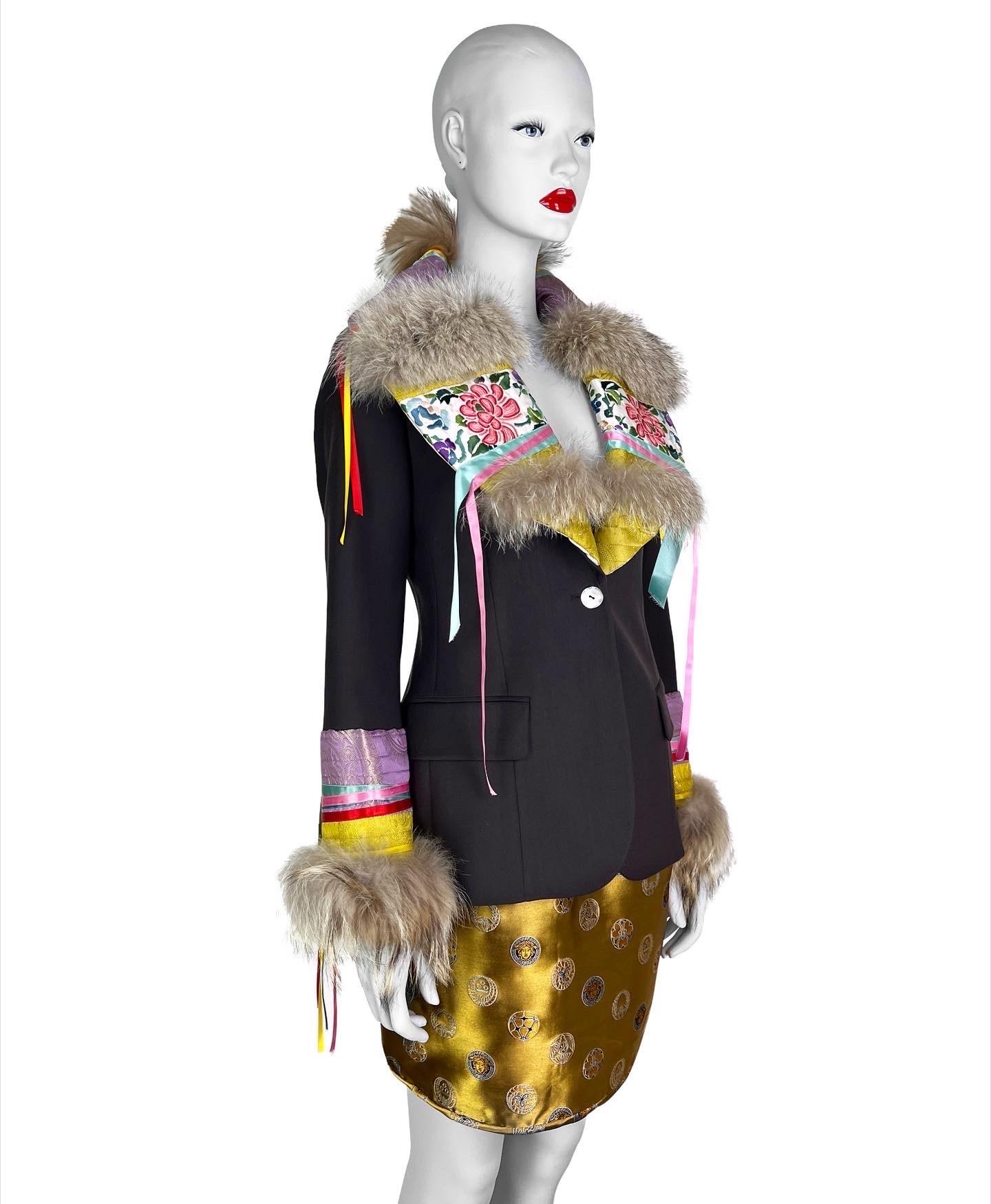 An outstanding John Galliano blazer with Coyote fur trim details and gorgeous patchwork with embroidery and decorative silk ribbons. 

Size FR 38 or US 4. Measurements (flat lay on one side):

Shoulder to shoulder - 35 cm (13,8 in)
Armpit to armpit