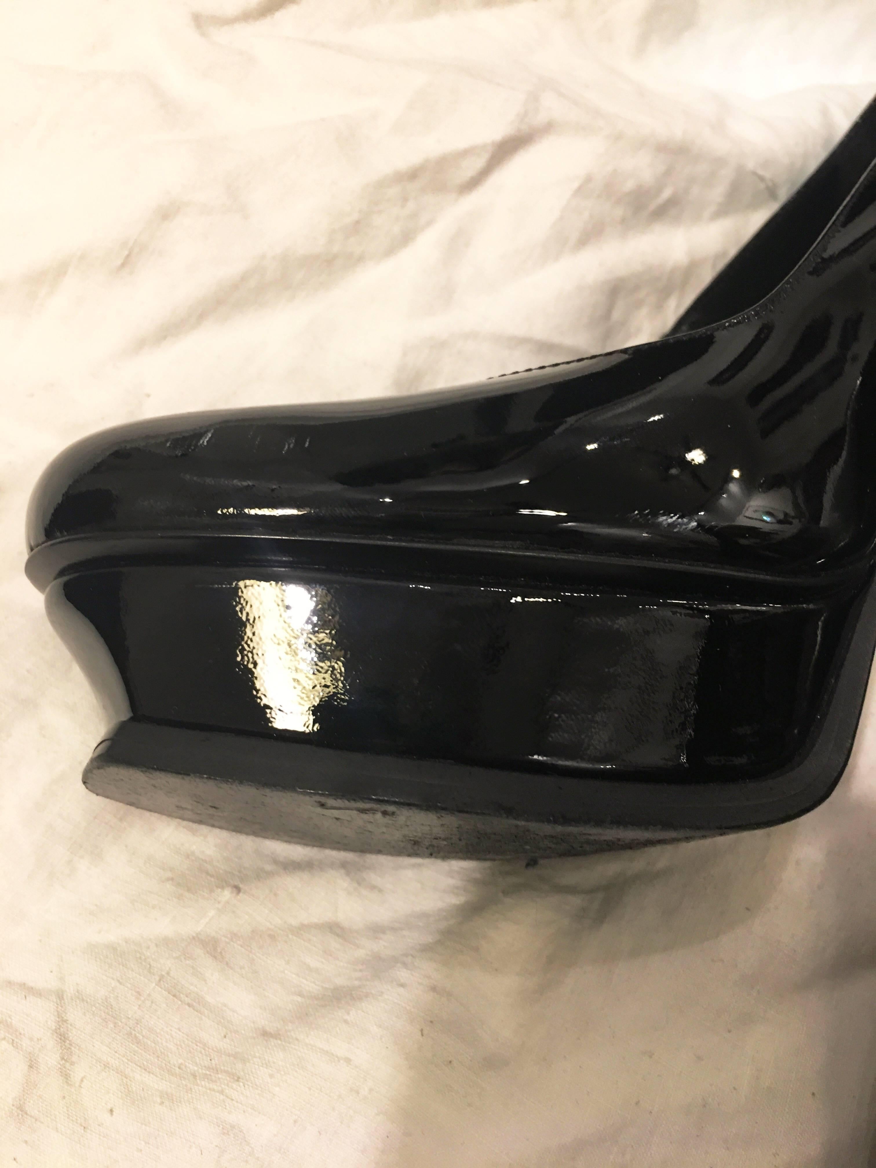 Not for those unaccustomed to wearing heels, these patent leather beauties command attention. 5.5 inch stiletto heels with an inch high platform at the toe. Some light scuffing on the heels. Made by the the forever classy Yves St Laurent and in
