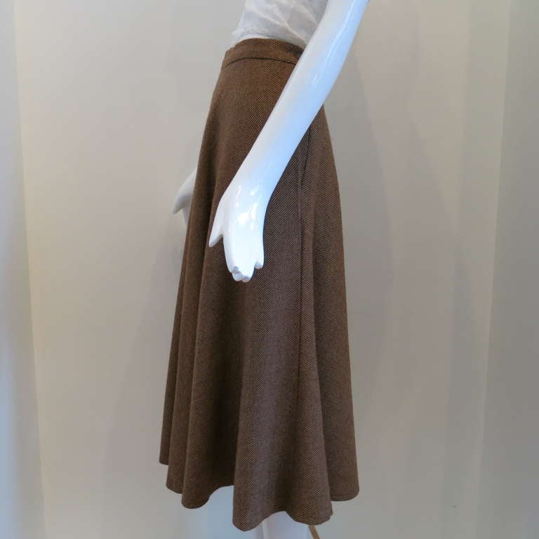 Vintage Ralph Lauren Purple Label Brown Wool Gaberdine Circle Skirt

Please contact dealer prior to purchase for White Glove shipping options.

Measurements (taken lying flat):
Width - 26