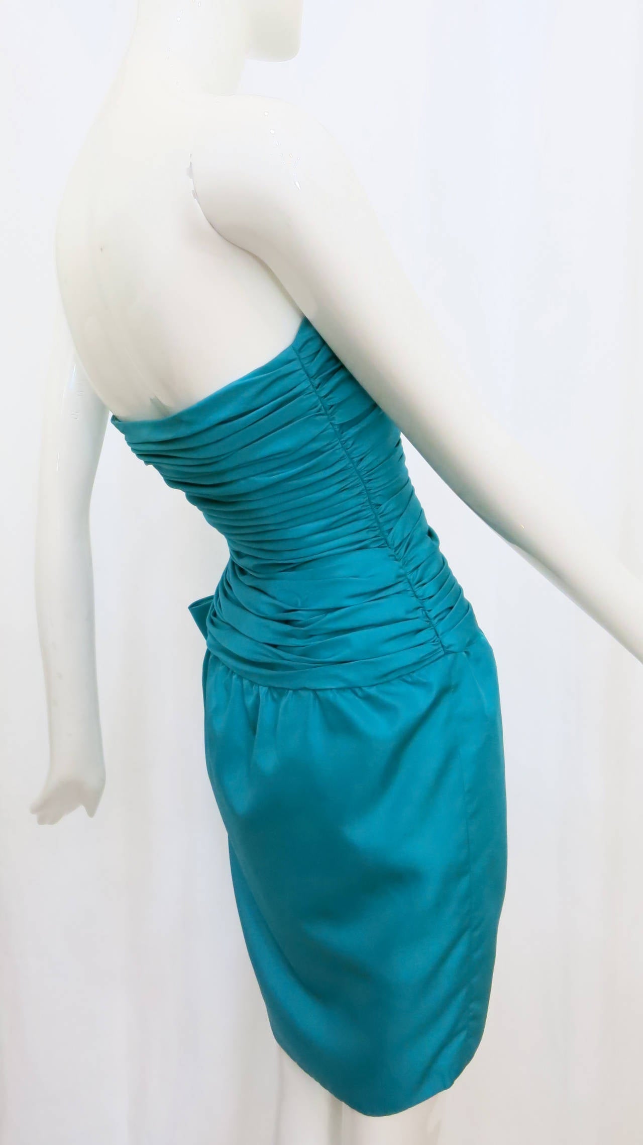 This elegant 1980s silk strapless cocktail dress from the Christian Dior 