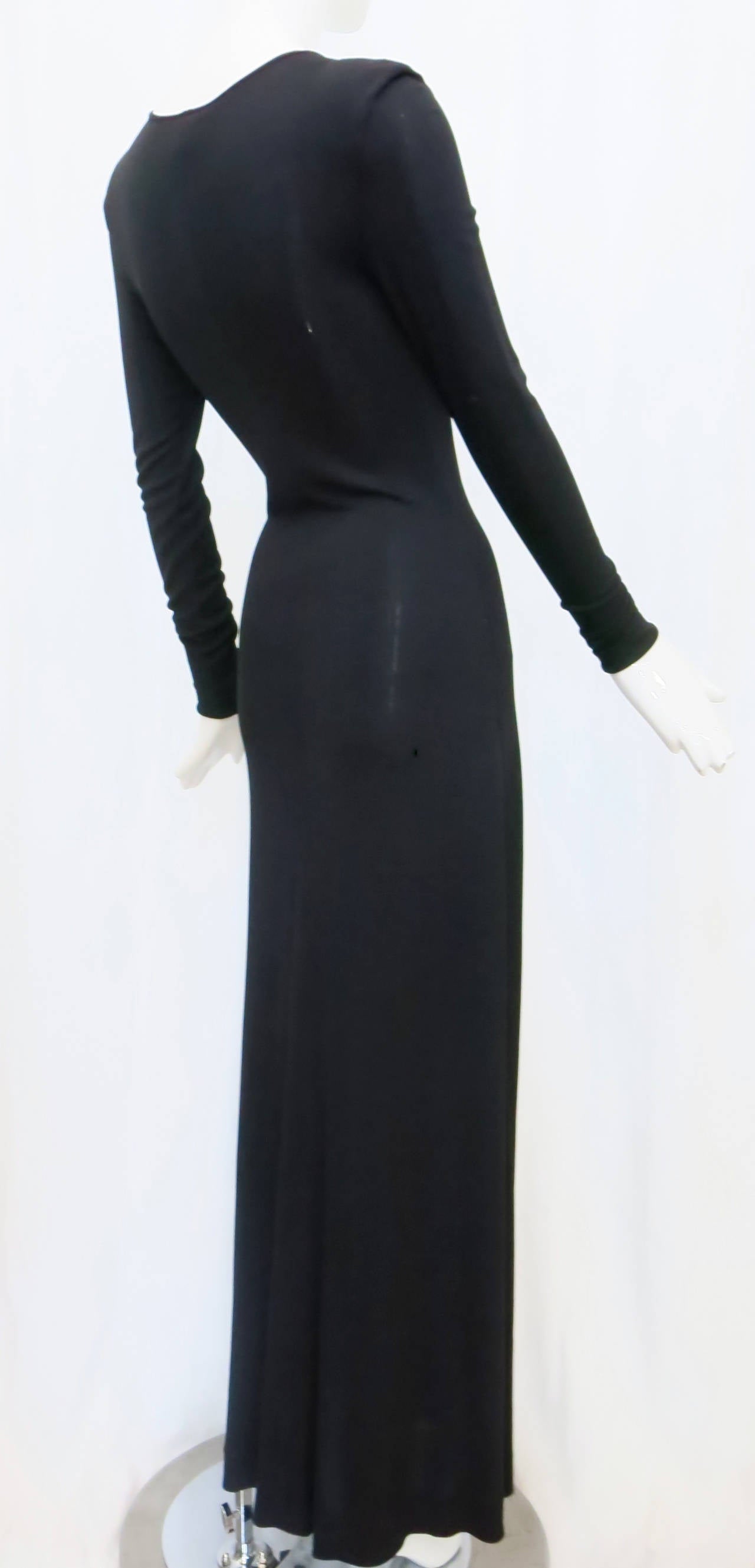 1980s slinky black maxi dress designed by the original 