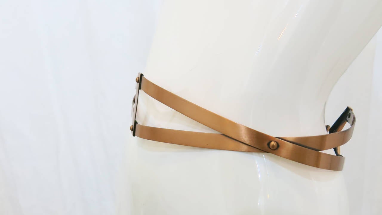 This 1950s copper belt is indicative of mid-century modern design: Renoir of California undertook the innovative task of elevating a humble metal by underscoring its inherent qualities–that is, its unique color, sheen and malleability. This belt in