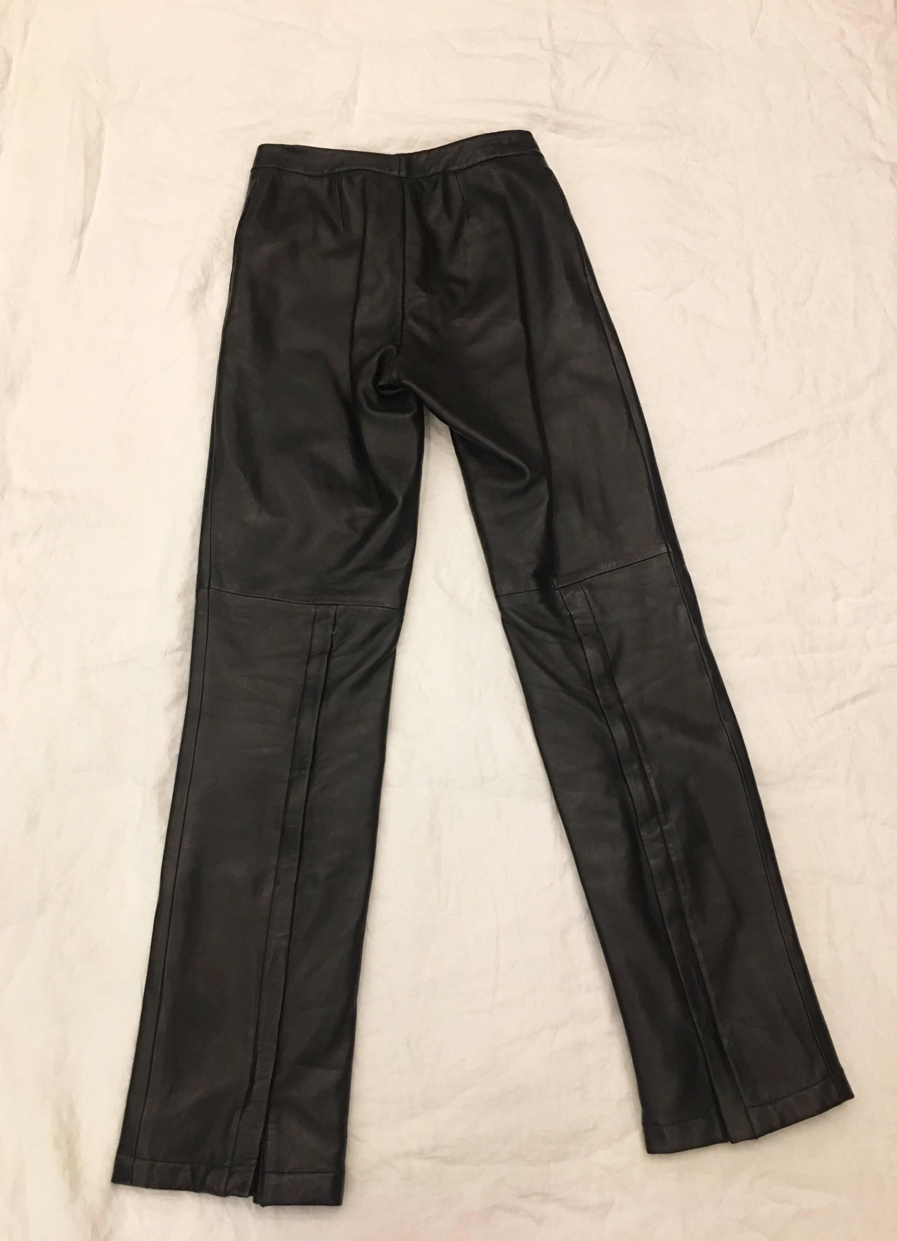 Perfect buttery soft brown leather pants by Gucci. Zippers up to right above calf. Hook and eye and zipper closure at waist. Zipper pockets on side of pants. 
