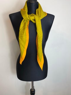 Bandeau Yves Saint Laurent dorato a pois.