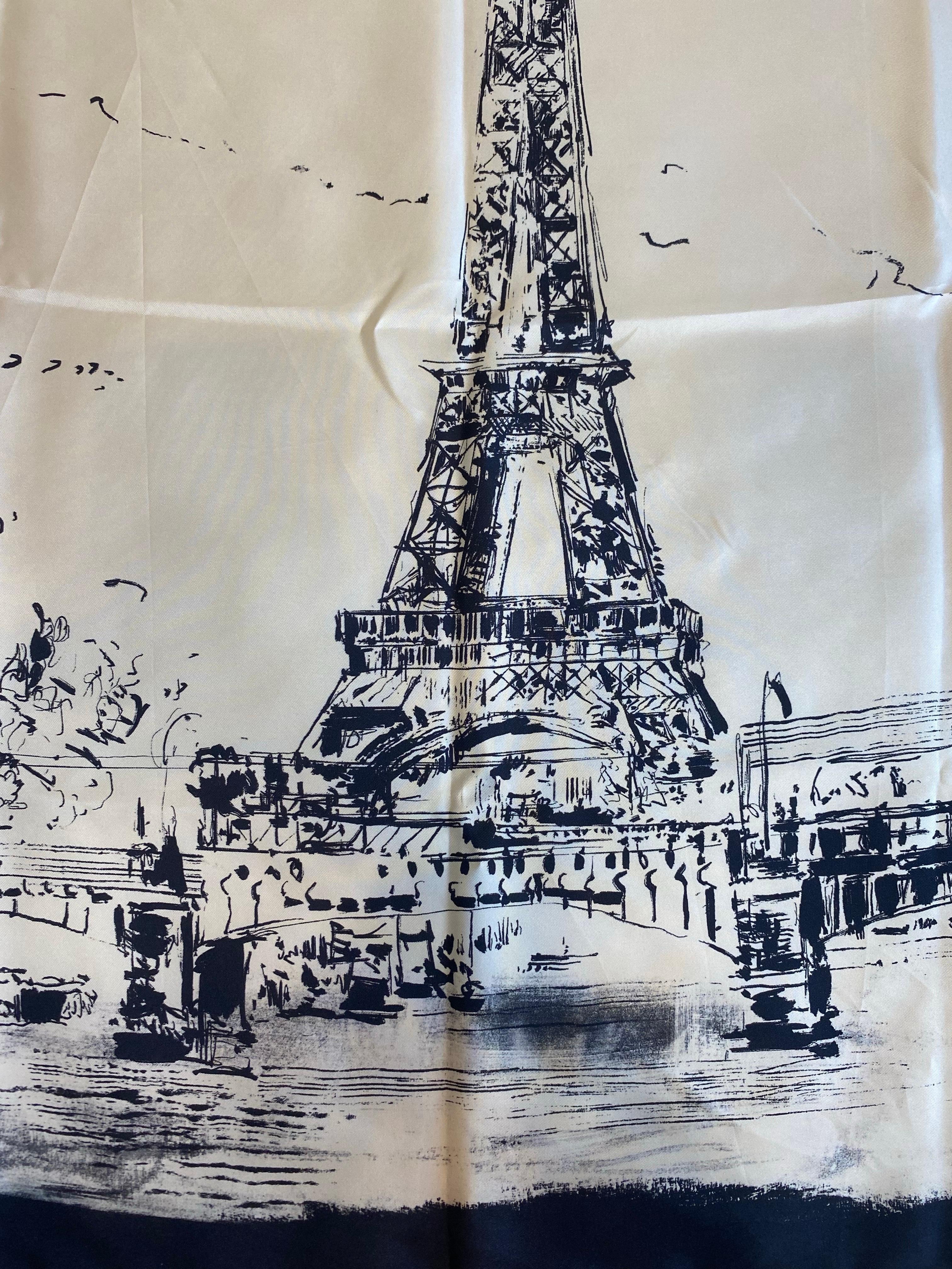 Pañuelo Christian Dior en blanco y negro con detalles de la Torre Eiffel.
90 cm x 90 cm.
100% seda.
Excelente estado.