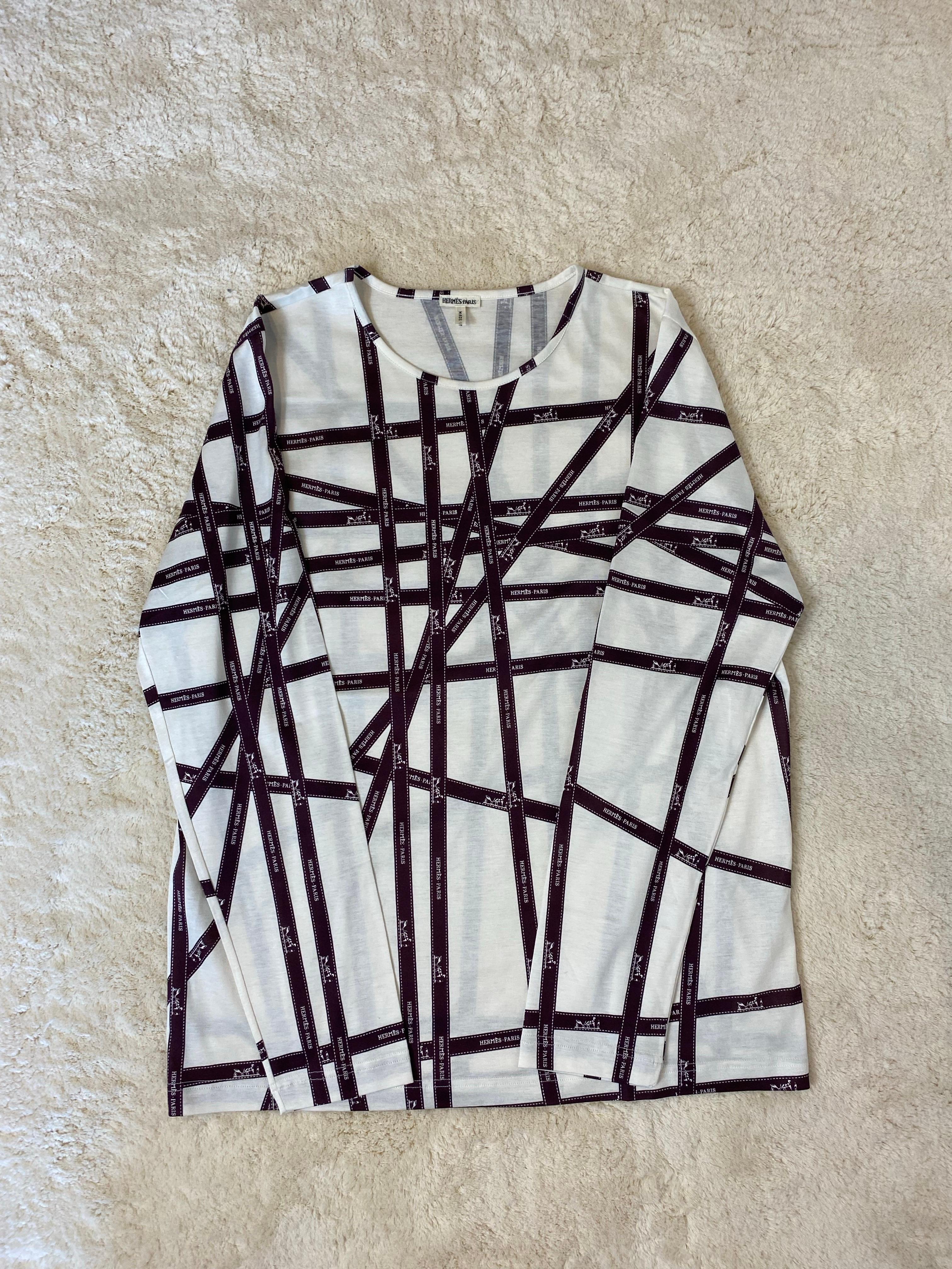 Langärmliges Hemd von Hermès Paris.
Passt in Größe 38/40 (IT).
Schultern: 42 cm.
Länge: 68 cm.
Kein Label. Es scheint aus Baumwolle hergestellt zu sein.
Ausgezeichneter Zustand, weist Gebrauchsspuren auf, wie auf den Fotos zu sehen.
