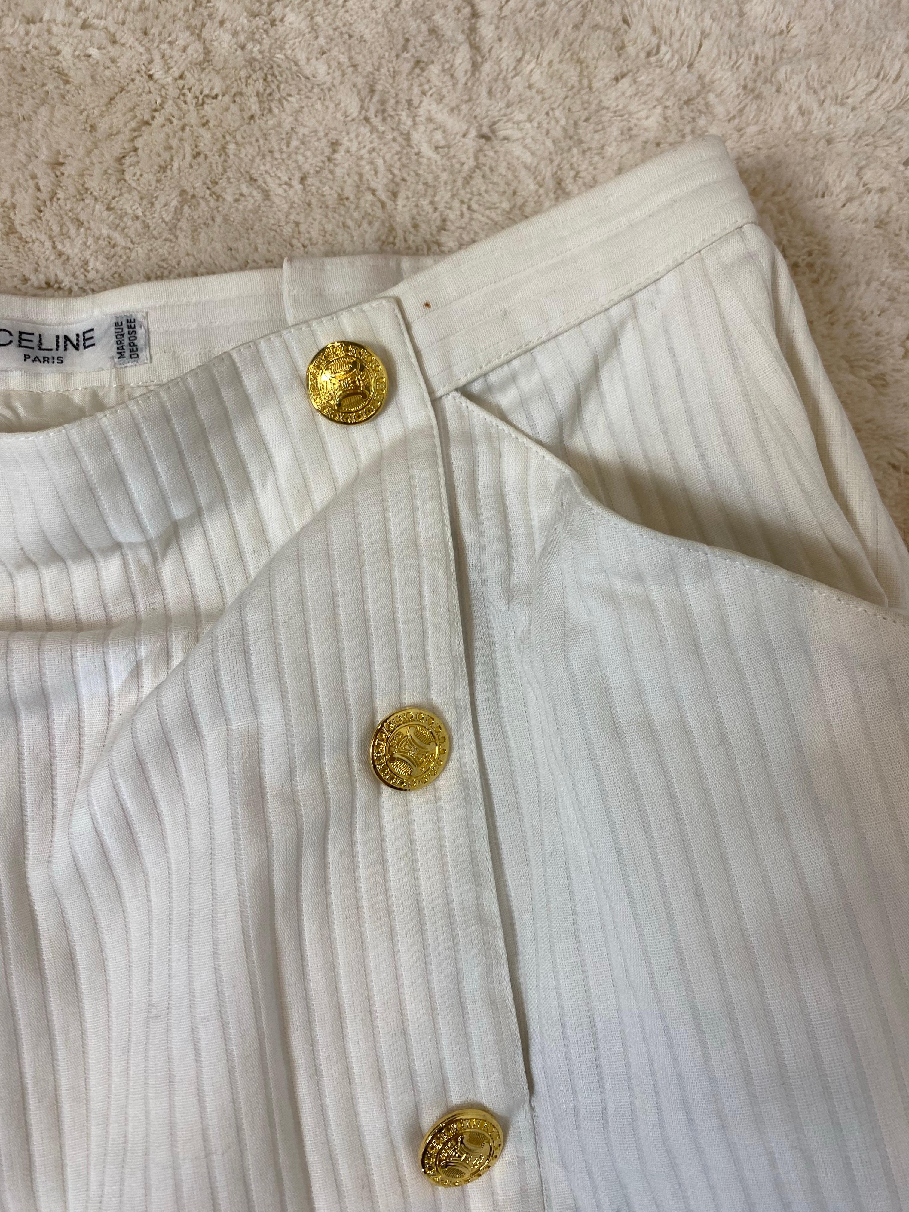 Falda Céline blanca con botones dorados. en venta 1