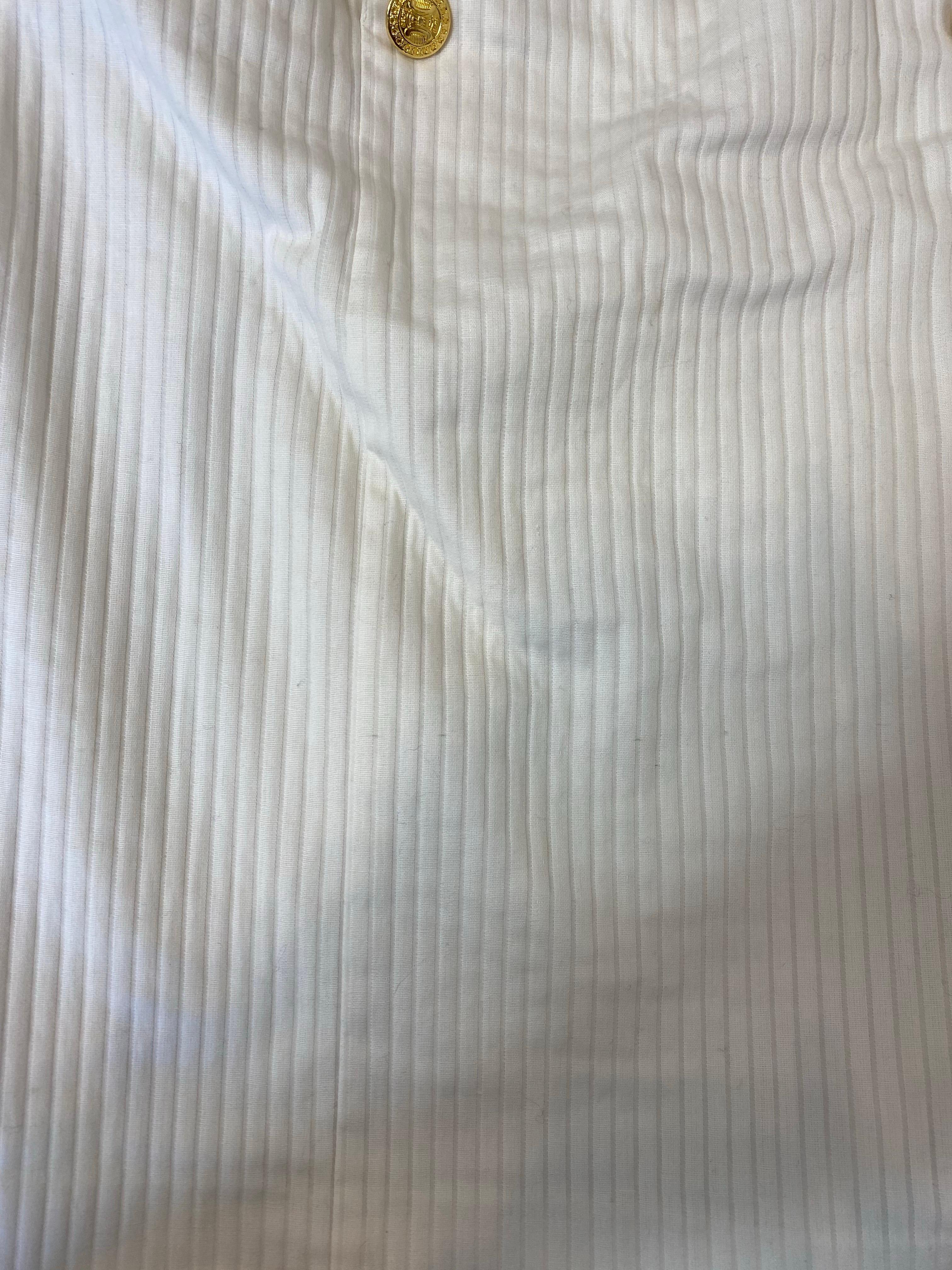 Femenino o masculino Falda Céline blanca con botones dorados. en venta
