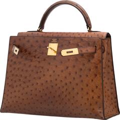Hermès - Sac Kelly 32 cm Noisette Ostrich Sellier avec accessoires dorés