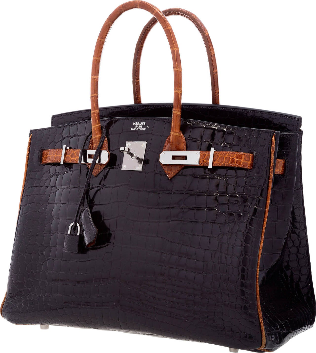 This bag is incredibly rare and beautiful. It is a limited edition Birkin that exemplifies the craftsmanship and incomparable quality of Hermes products. It is done in Shiny Porosus Crocodile, one of the most valuable and luxurious materials