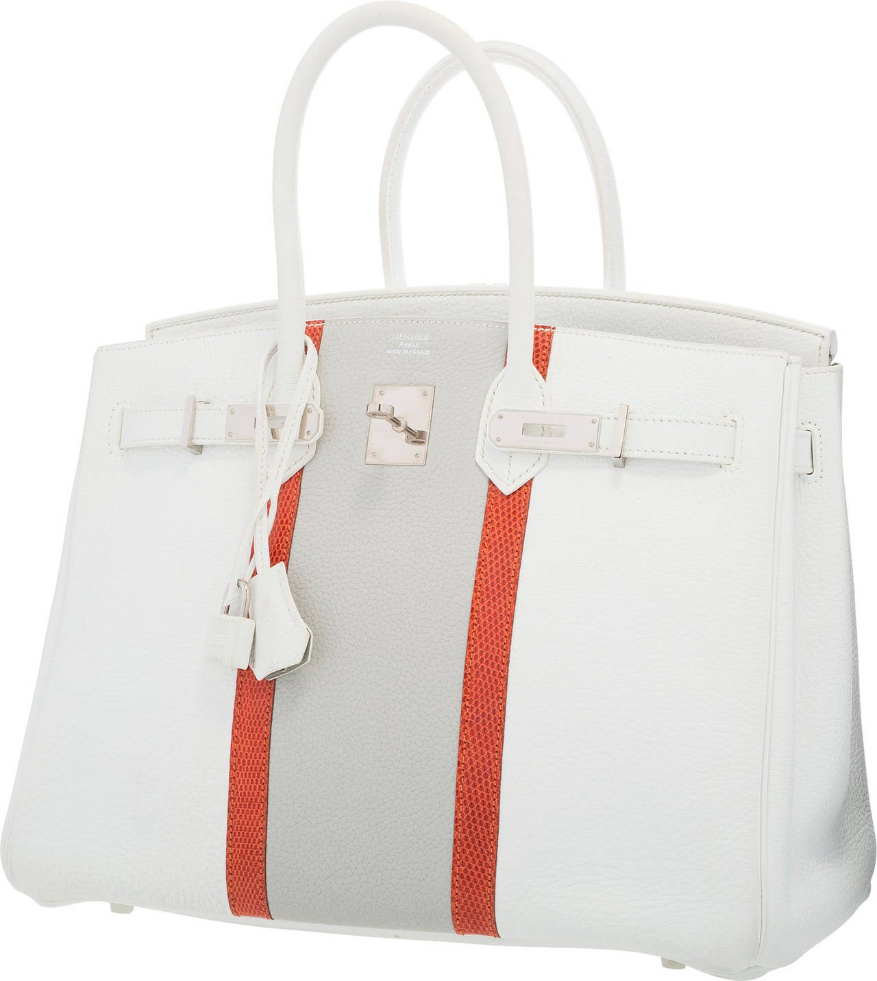 This Limited Edition Birkin is rare, unique, and gorgeous. It is done in crisp colors of White, Gris Perle, and Sanguine, making even this incredibly rare bag perfect for the Hermes collector. The exterior is done in Clemence and Togo Leathers with