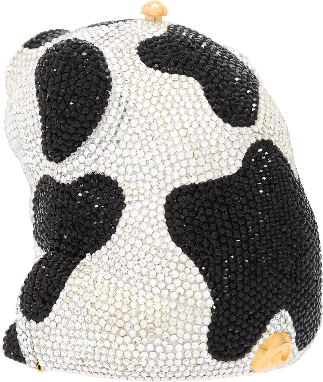 Cute and quirky, this pig minaudiere is a great way to add a fun monochrome piece to a look, and also makes the perfect collectors piece for Judith Leiber habitués. This minaudiere is done in black and silver crystals, fashioned in a piebald