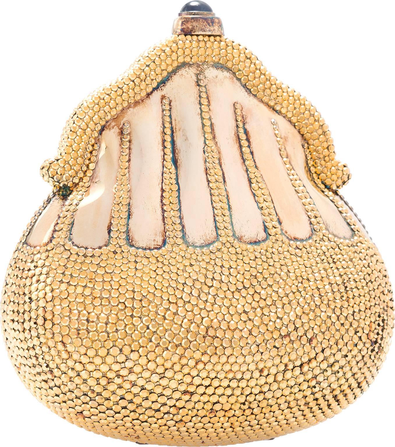 The original minaudiere, the chatelaine minaudiere evening bag is Judith Leiber's first design, originally done in 1967. This chatelaine bag is an incredible collectors piece. Done in a limited edition of just one hundred and fifty bags, this