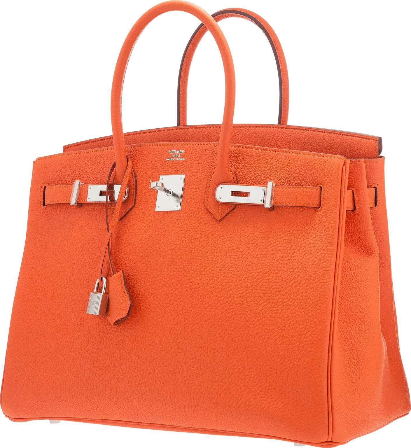 A fabulous new color for 2015, Orange Poppy is a bright color with fabulous and subtle pink undertones. A wonderful piece for a color burst in a look, this Birkin is sure to attract much envy. This bag is done ine Orange Poppy Togo Leather,