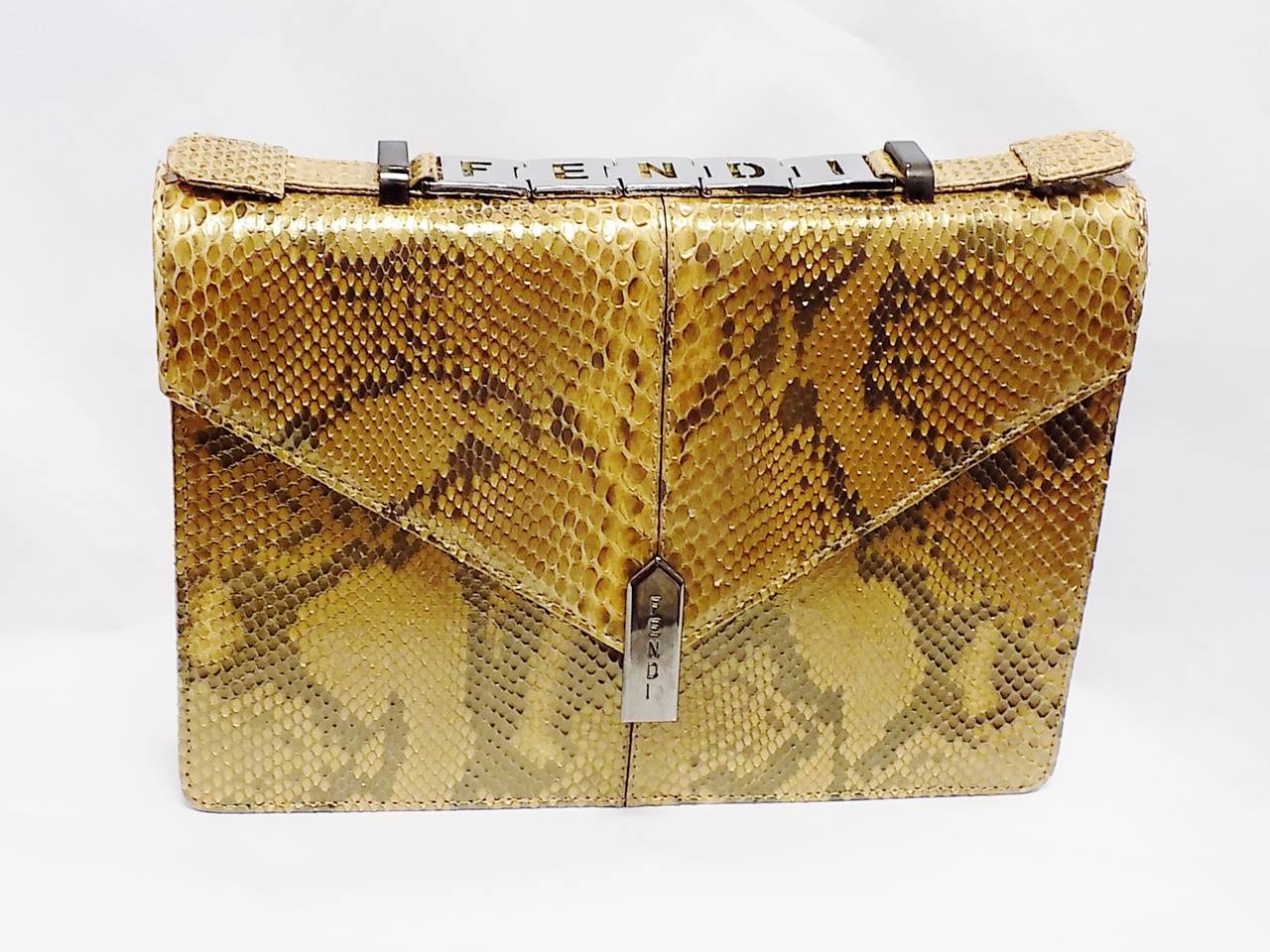 New and never used Fendi special order bag  in python from 1996 with all documents  so awesome! One of a Kind 
Origin of Python Diamante  from Indonesia with license number to be shipped to Fendi as a special order. 
Bag is envelope style clutch