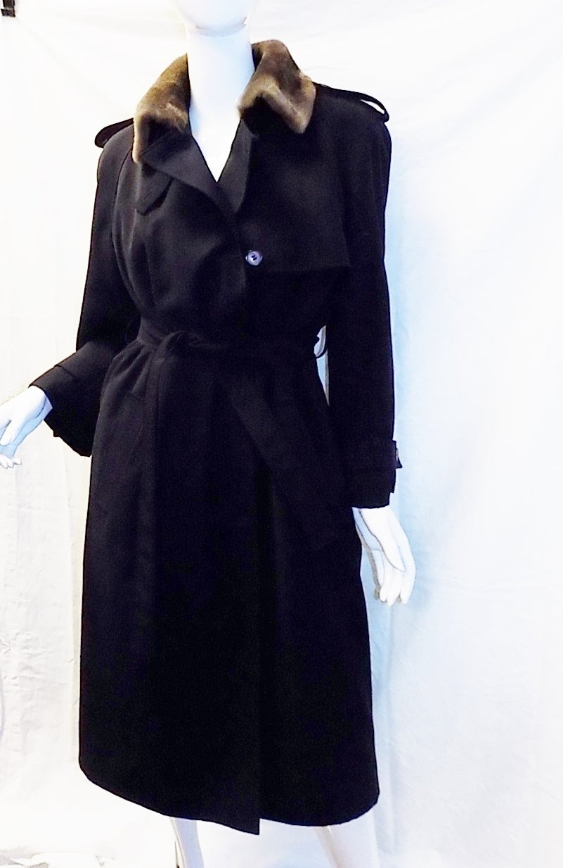 Pristine condition like new !No signs of any wear.  J Mendel  lite Navy trench coat with Luxurios sheared  mink lining  ABSOLUTELY SPECTACULAR!. Mink is female skin weight almost nothing. Lining attached by buttons completely removable. Horne