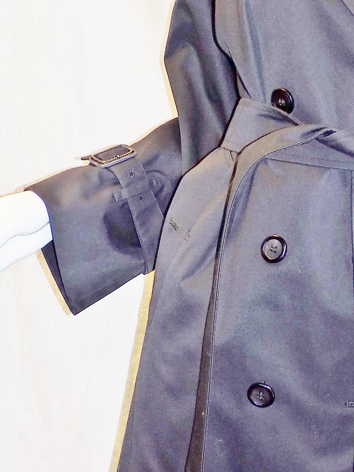 Burberry London's black gabardine trench coat is cut in the brand's 