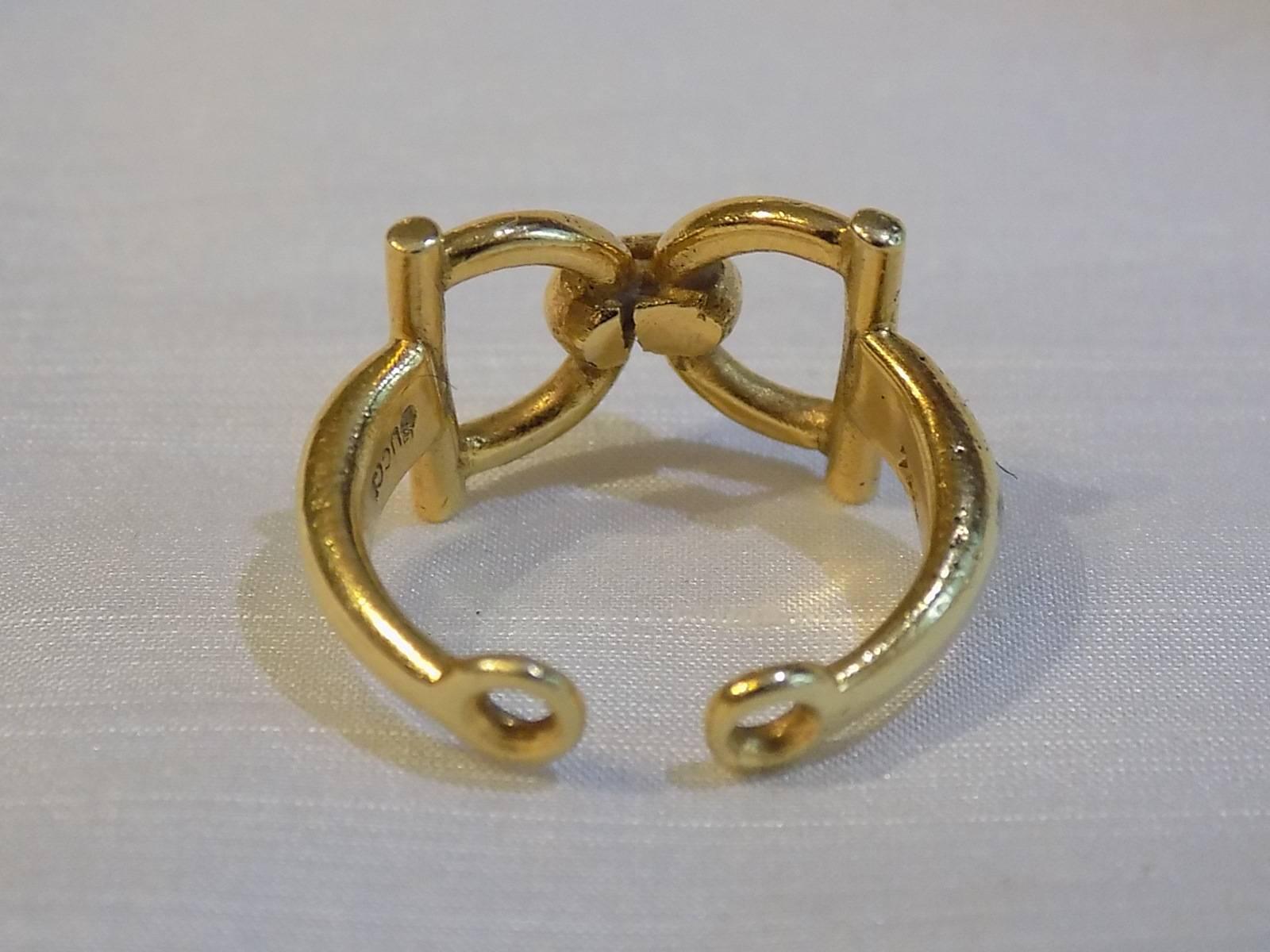 Beautiful. Circa 1990's , 18K solid gold. Pretty heavy ring. Stamped Gucci .  Horsebit is 1/2 inch 3/4