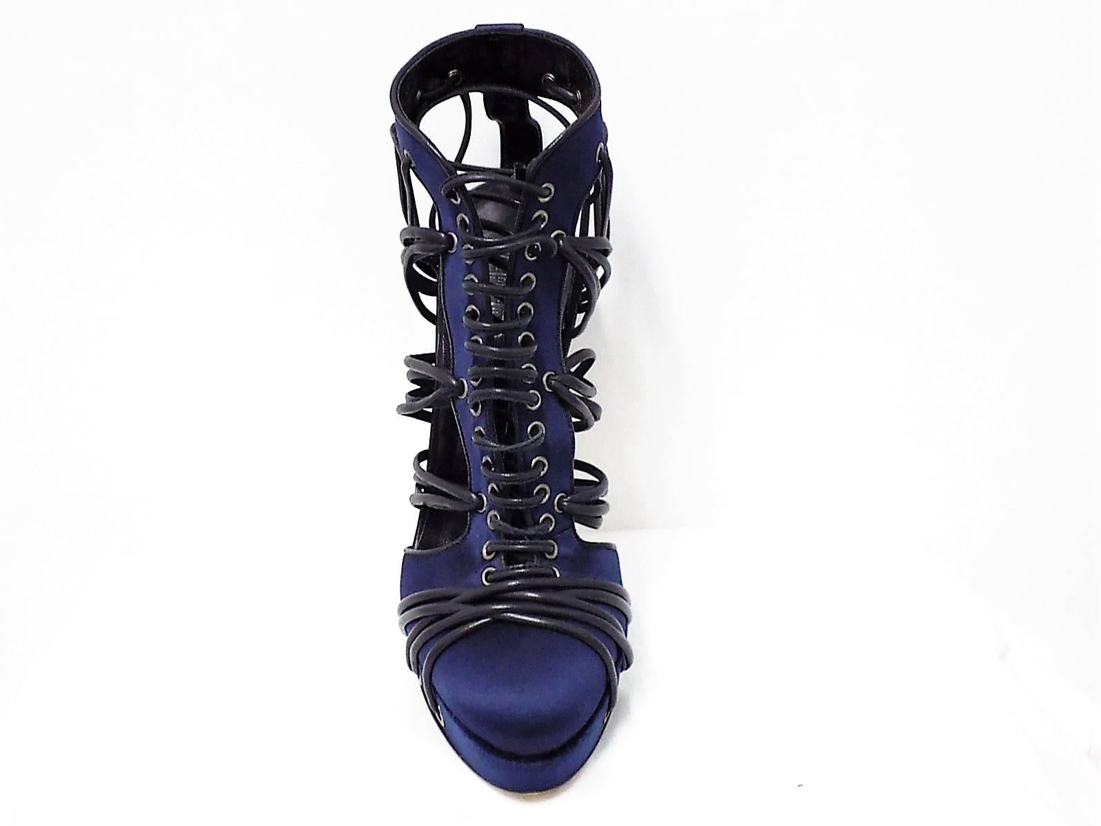 Spectacular navy and black  silk / leather/ velvet Versace- Vesrus  Gladiator  Ankle  Strap Booties. Silver grommets.  New . Only tried at the store, Not worn outside.  sz 40 Platform 1 inch  heel 5.5