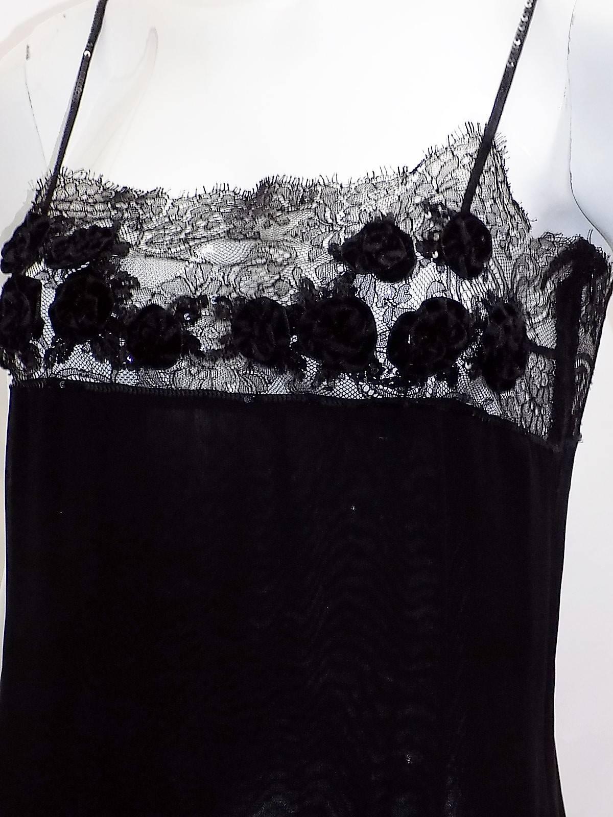 Fabulous black silk with lace Blumarine slip dress. A must have trend for a season. Hand made small rosettes placed strategically  at the bust line  to  cover the  right places. Micro sequin trim on the straps and embroidery on the lace.   Pristine