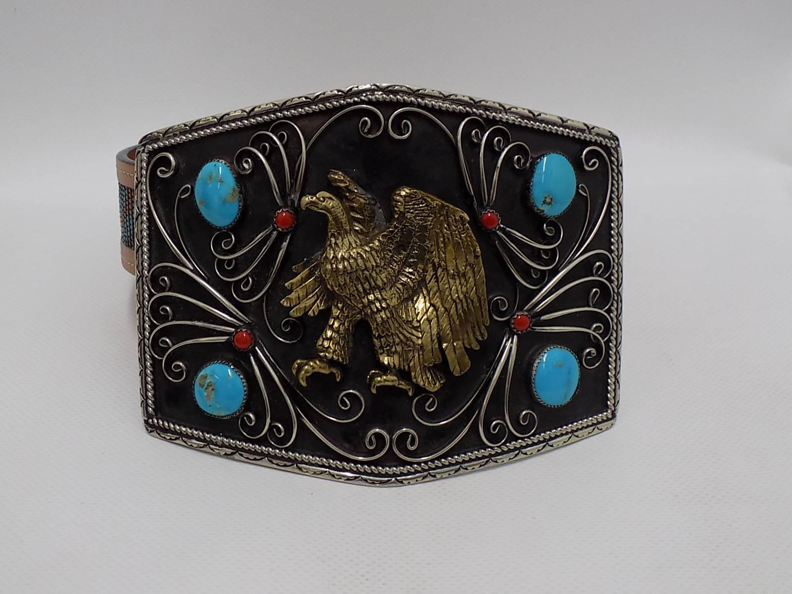 all hand crafted Cowboy legends massive silver  belt buckle  with genuine  and coral   turquoise /eagle hand carved eagle belt strapped is removable belt buckle measures 4 1/2 