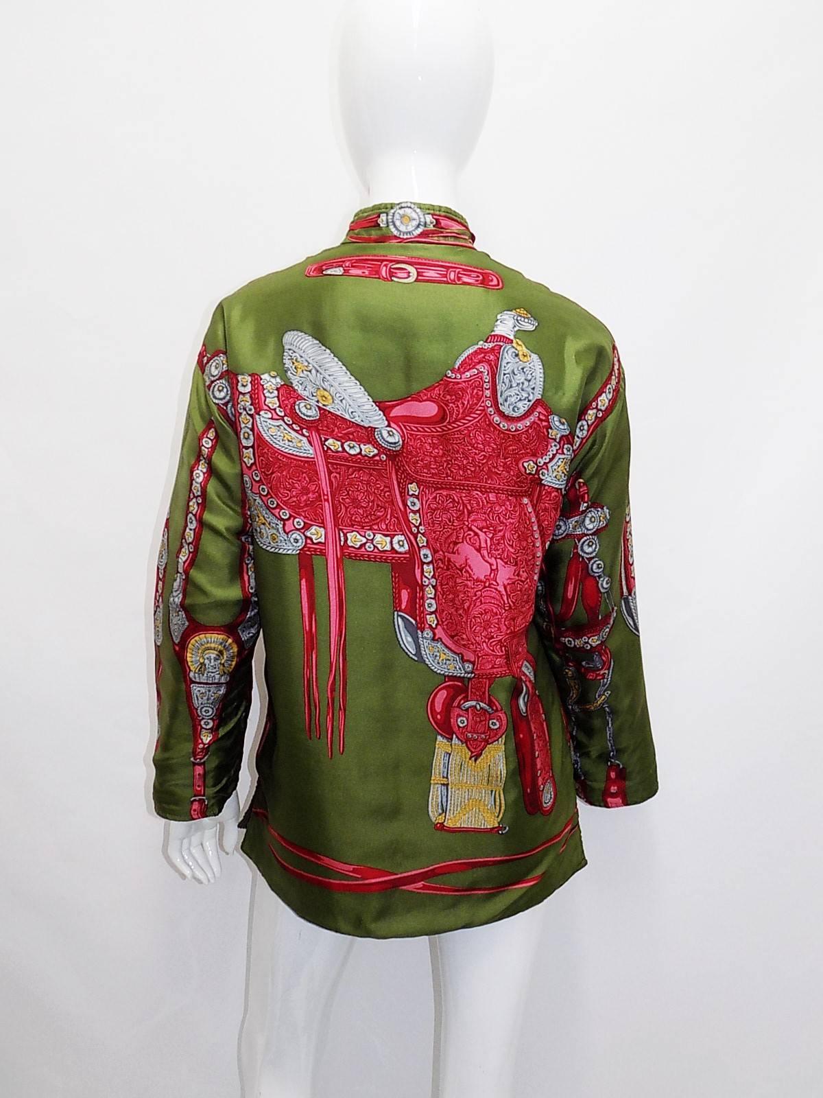 Gucci  vintage reversible quilted  jacket silk twill with Indian equestrian prints horse bid in green burgundy with silver and gold details . jacket can be reversed into waffled  corduroy fabric very light weight zipper front closure two side slits