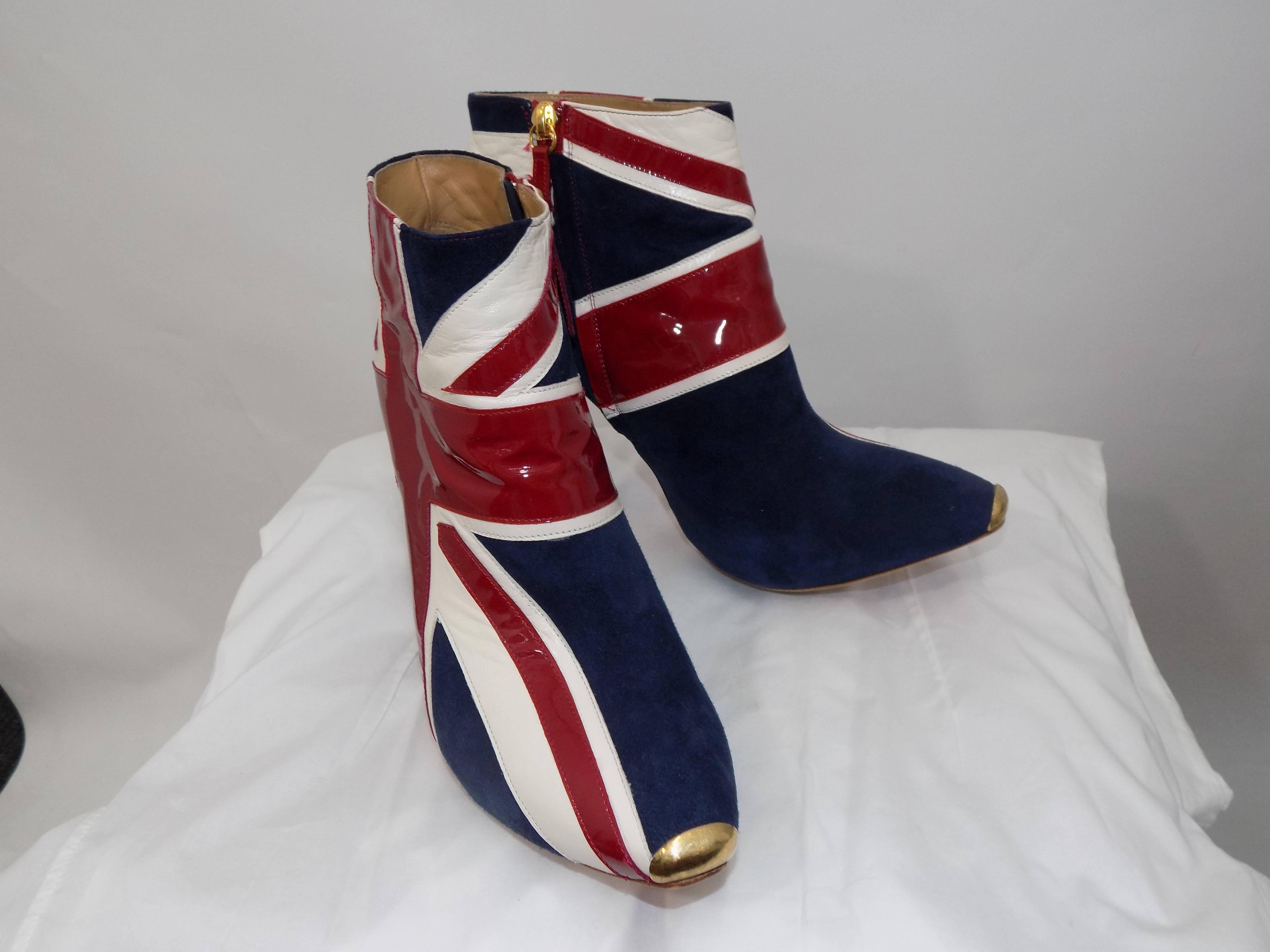 ALEXANDER MCQUEEN Union Jack ankle boots  Details Patriotic and very rock 'n' roll, wear these boots to give your look a modern punk vibe. Team them with a full skirt for a fun and flirtatious evening look.These beautiful Alexander McQueen ankle