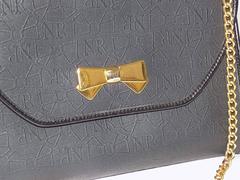 Nina Ricci black coated canvaswith gold chain bag / clutch