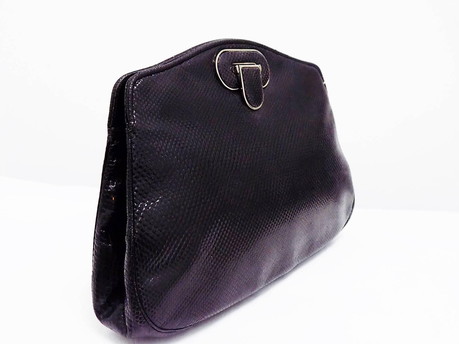 Very pretty and perfect size for all your necessities . Vintage Judith Leiber black exotic skins  bag. . Silver tone hardware. Fabulous Bag in Bag design with snap closure and three compartments.    Measures 10.5