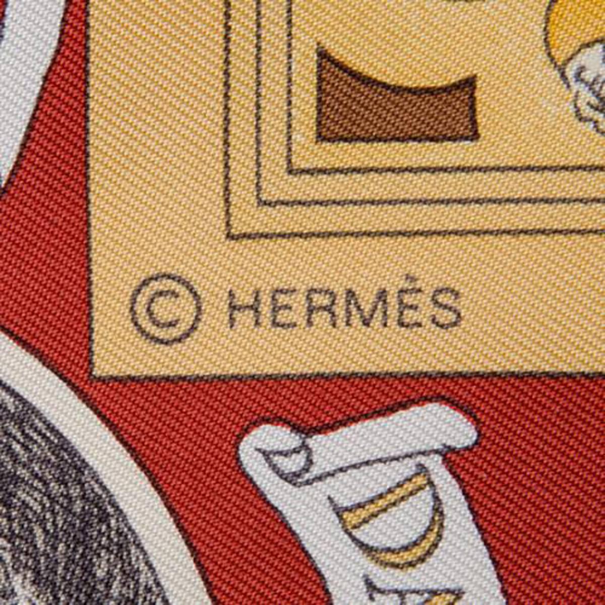 This Hermes Scarf is gently used but it is  in perfect condition.  It measures 35