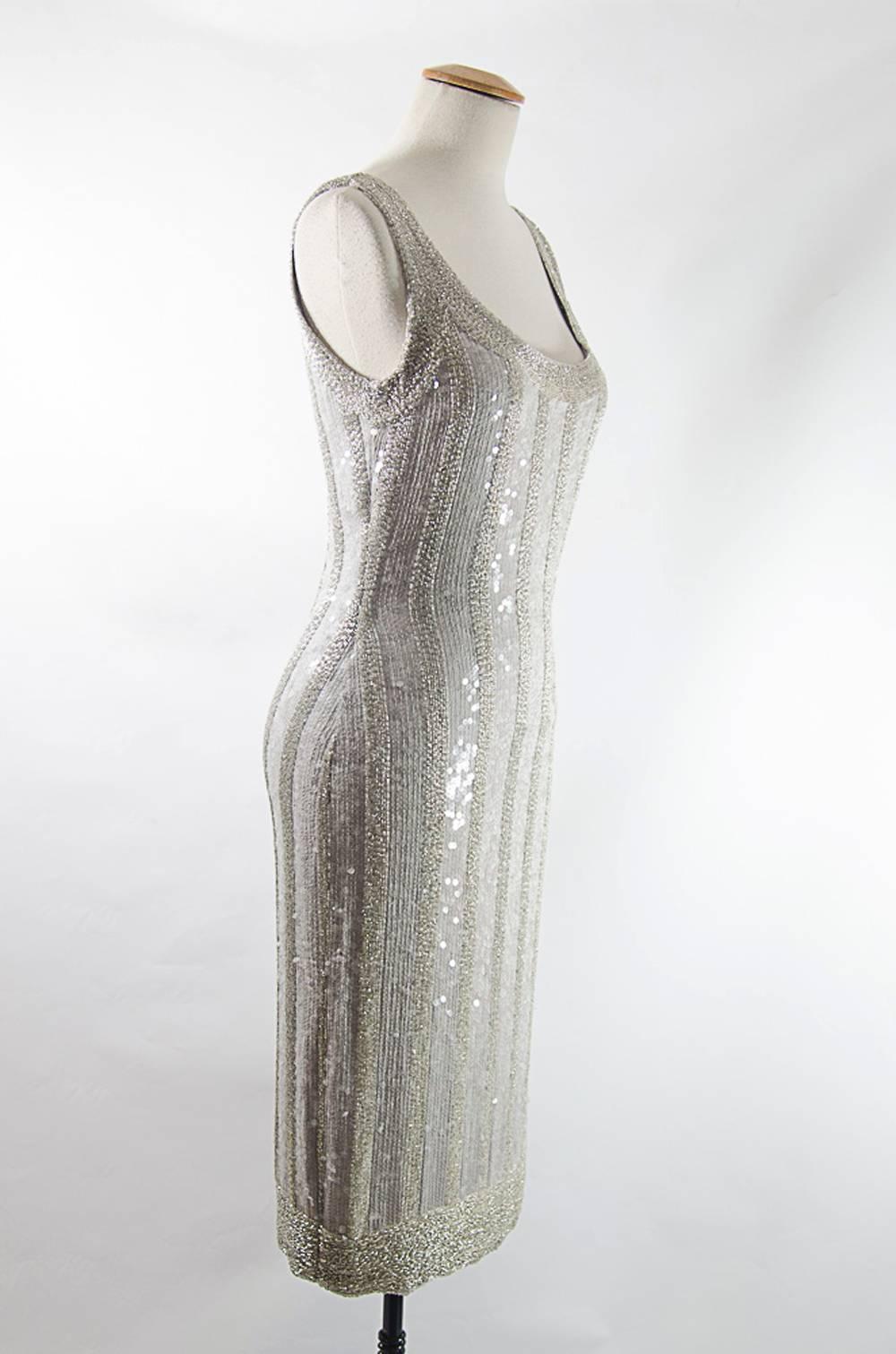 Beautiful Silver heavily hand  beaded Dress. Pristine condition. All beads intact. Circa 1960. Size 6