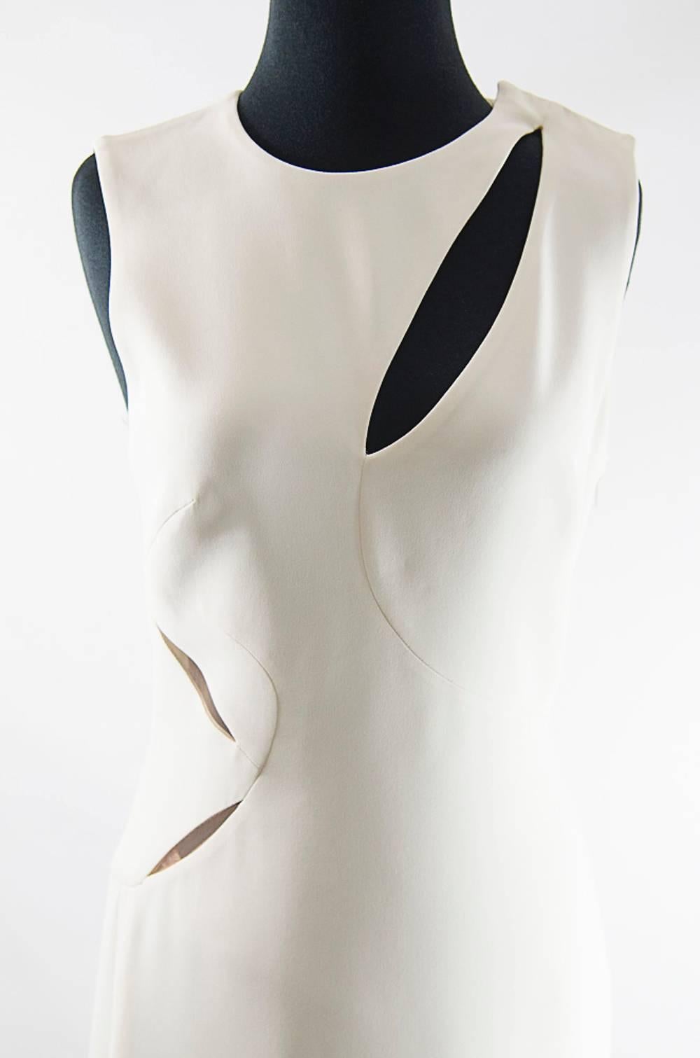 Versace Assymetrical Cutout ivory  gown In Excellent Condition For Sale In New York, NY